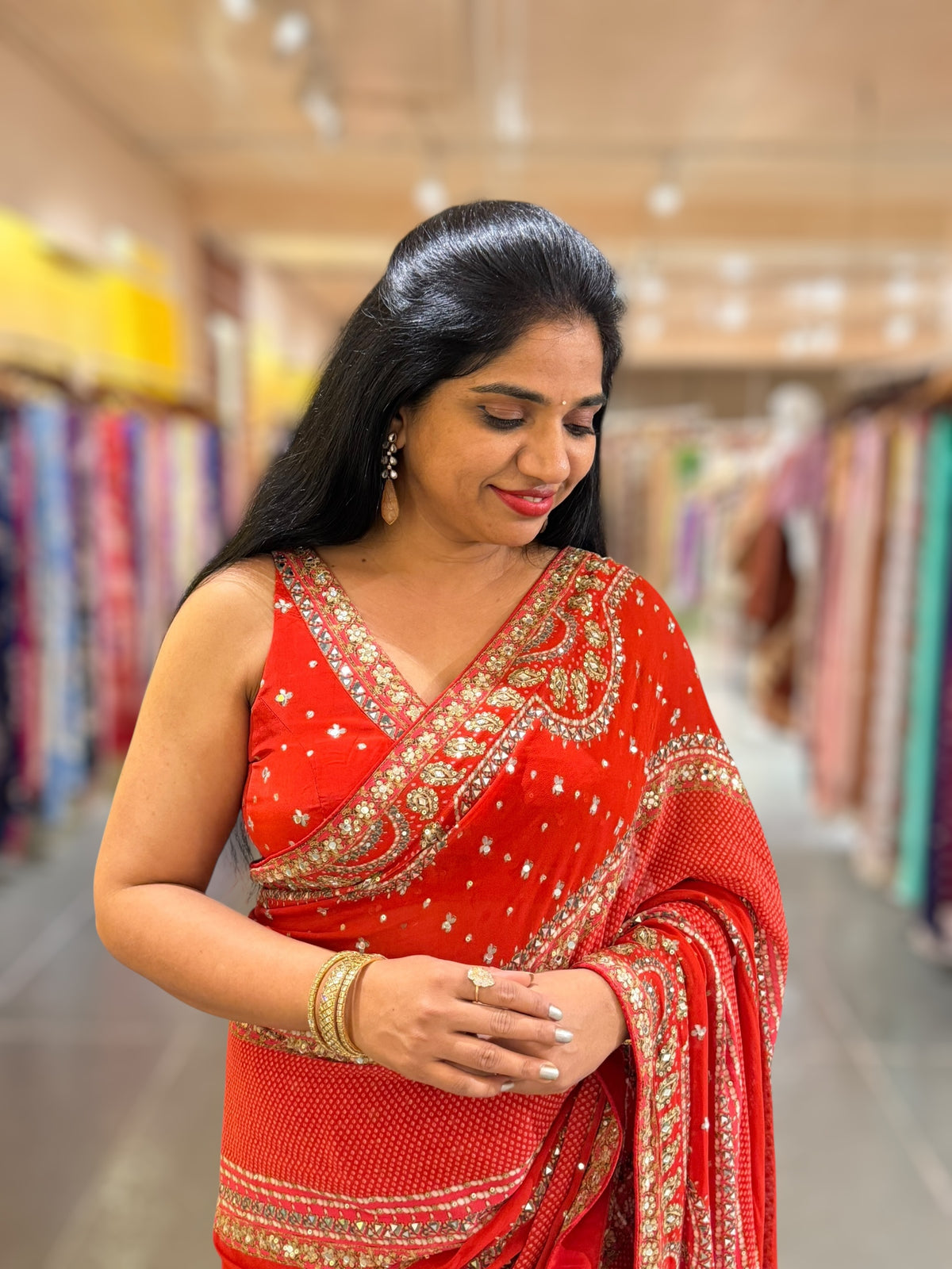 Orangish Red Kareena Inspired Gorgette Saree with allover mirrors