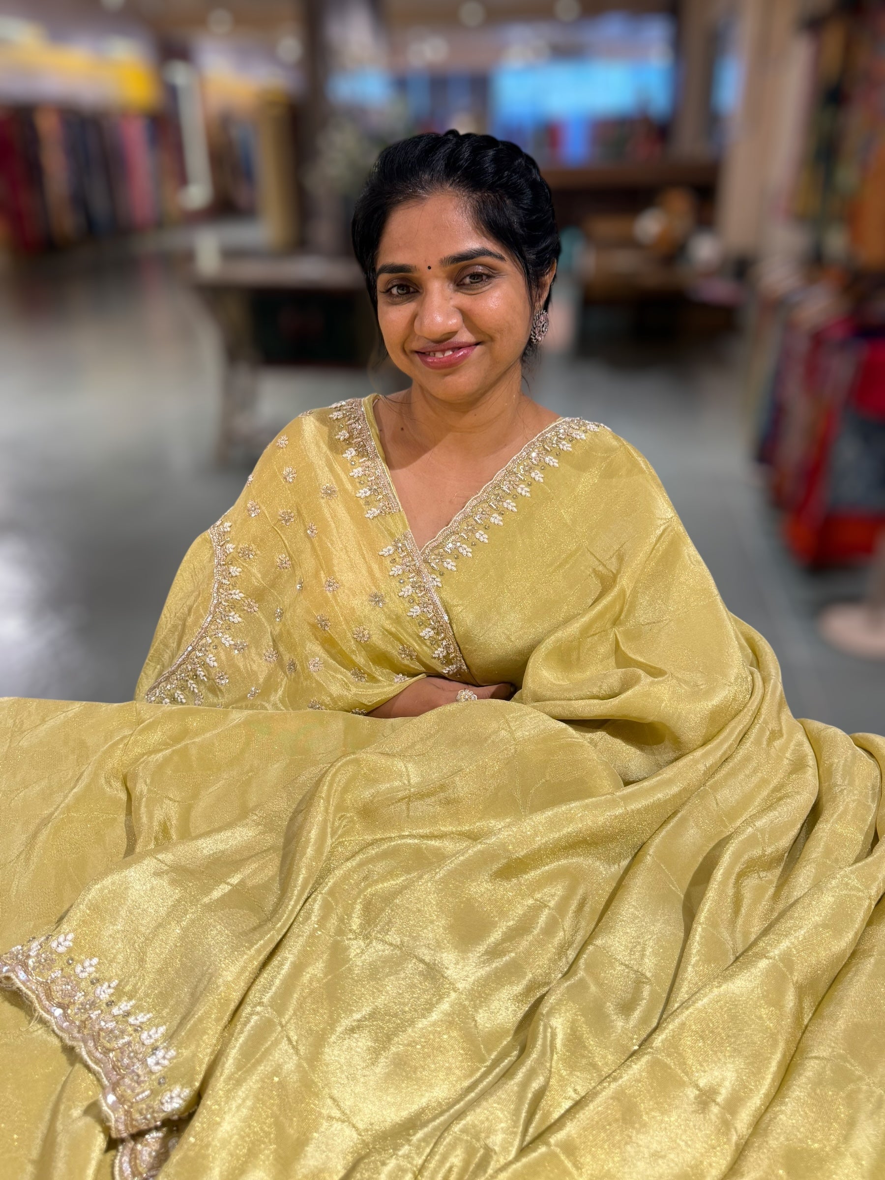 Pastel Yellow Tissue Gorgette Saree With Hanwork Border and Blouse.