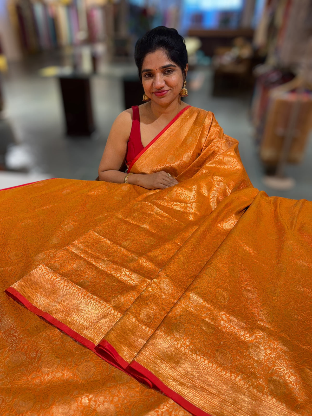 Orange Banarasi katan Tonchoi weaving Saree with red selvedge