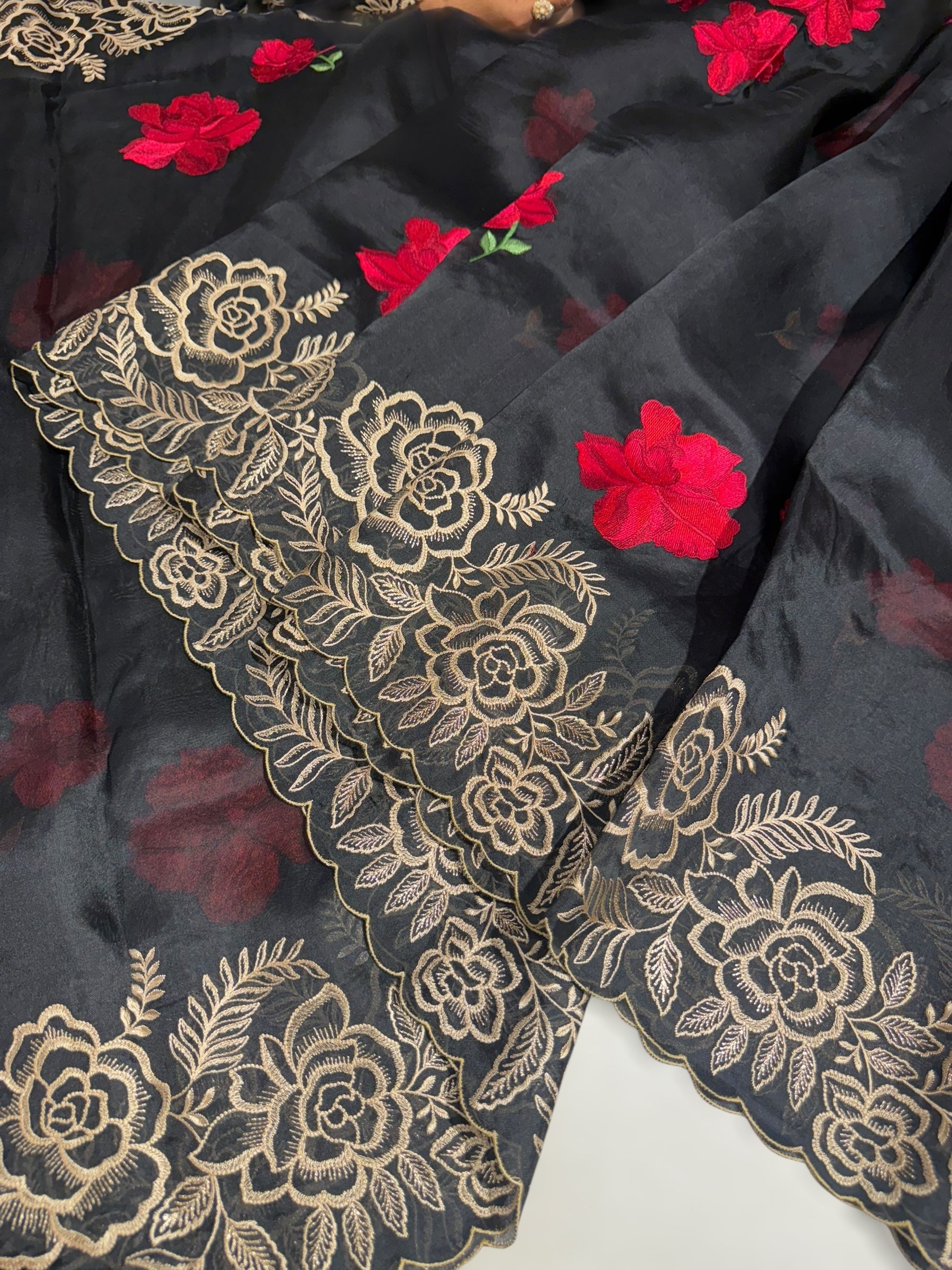 Black Organza Saree with stunning outline floral embroidered cytwork border and red hibuscus flowers allover