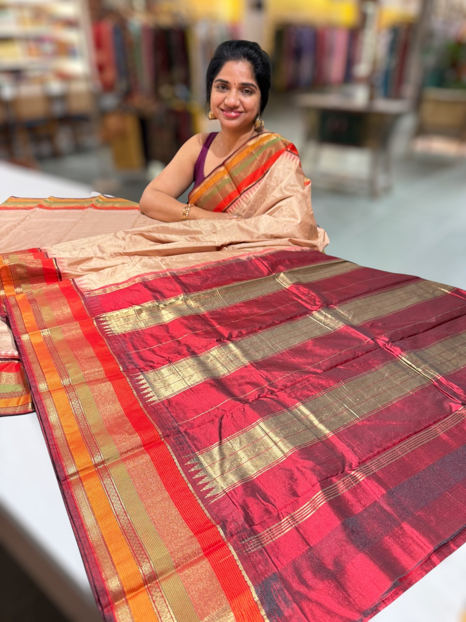 Nude Pink Kanchi vintage style soft silk saree with zari checks & multi color border.