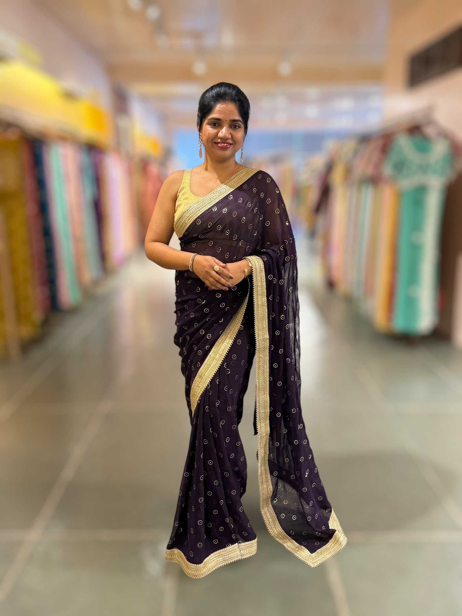 Violet Georgette Saree with stick on Badla in flower pattern