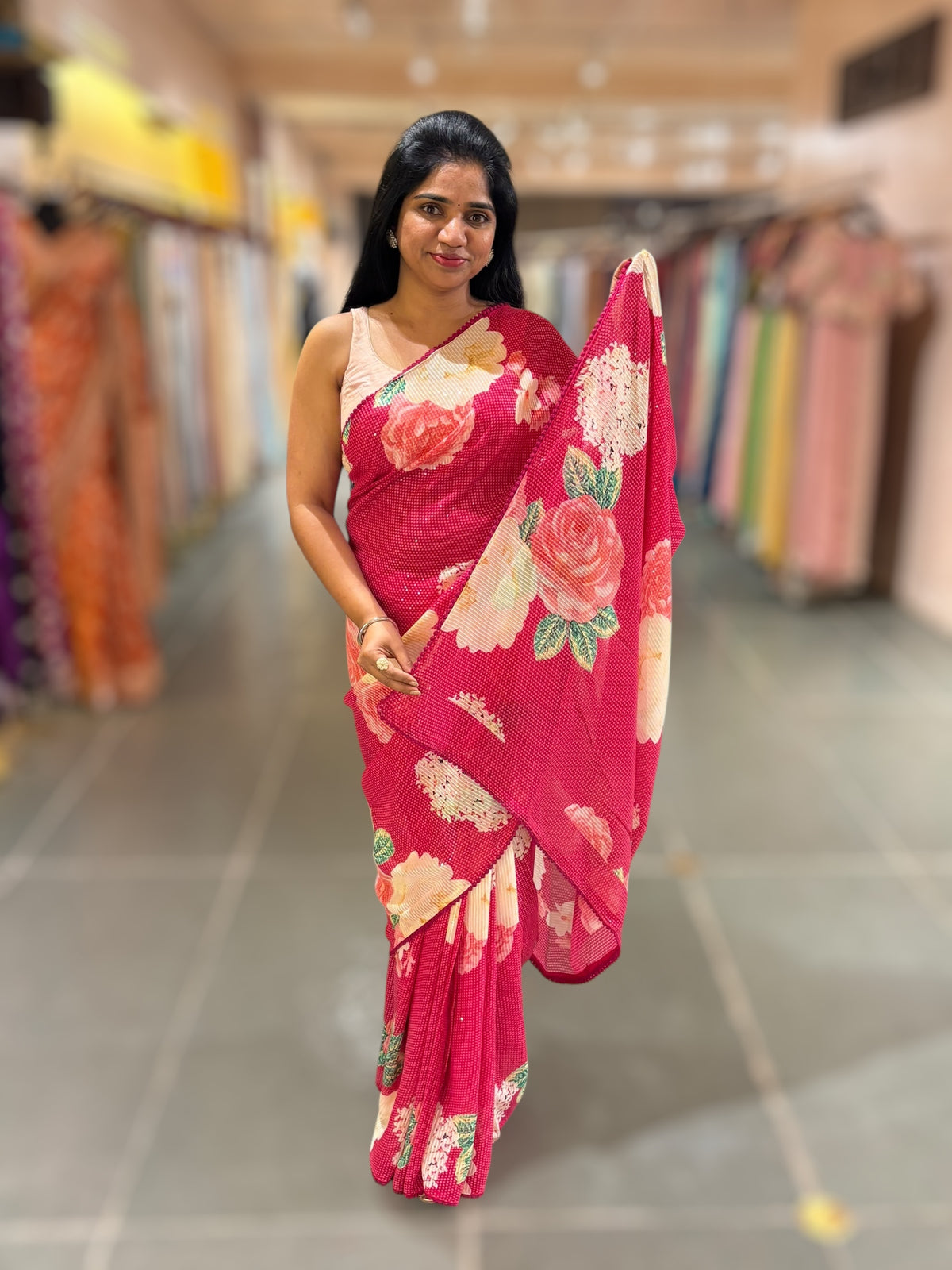 Reddish Pink georgette sequence saree with statement floral print