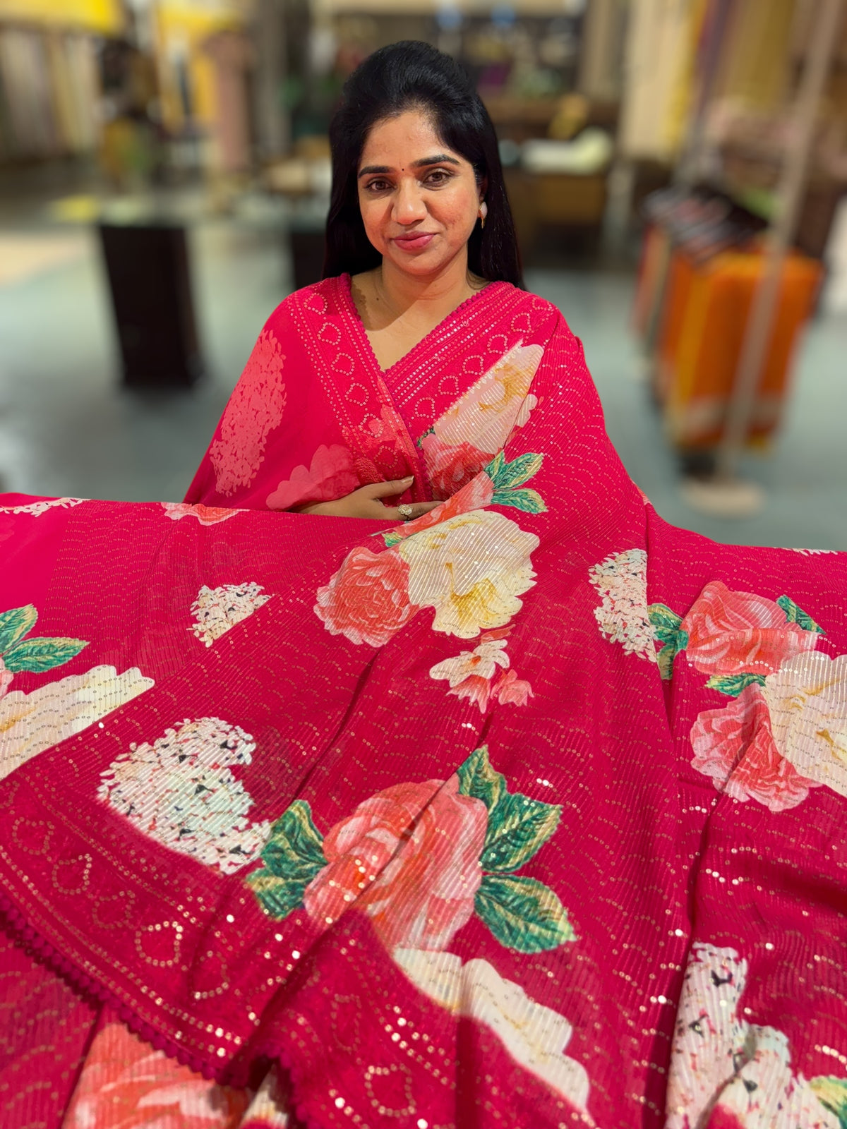 Reddish Pink georgette sequence saree with statement floral print