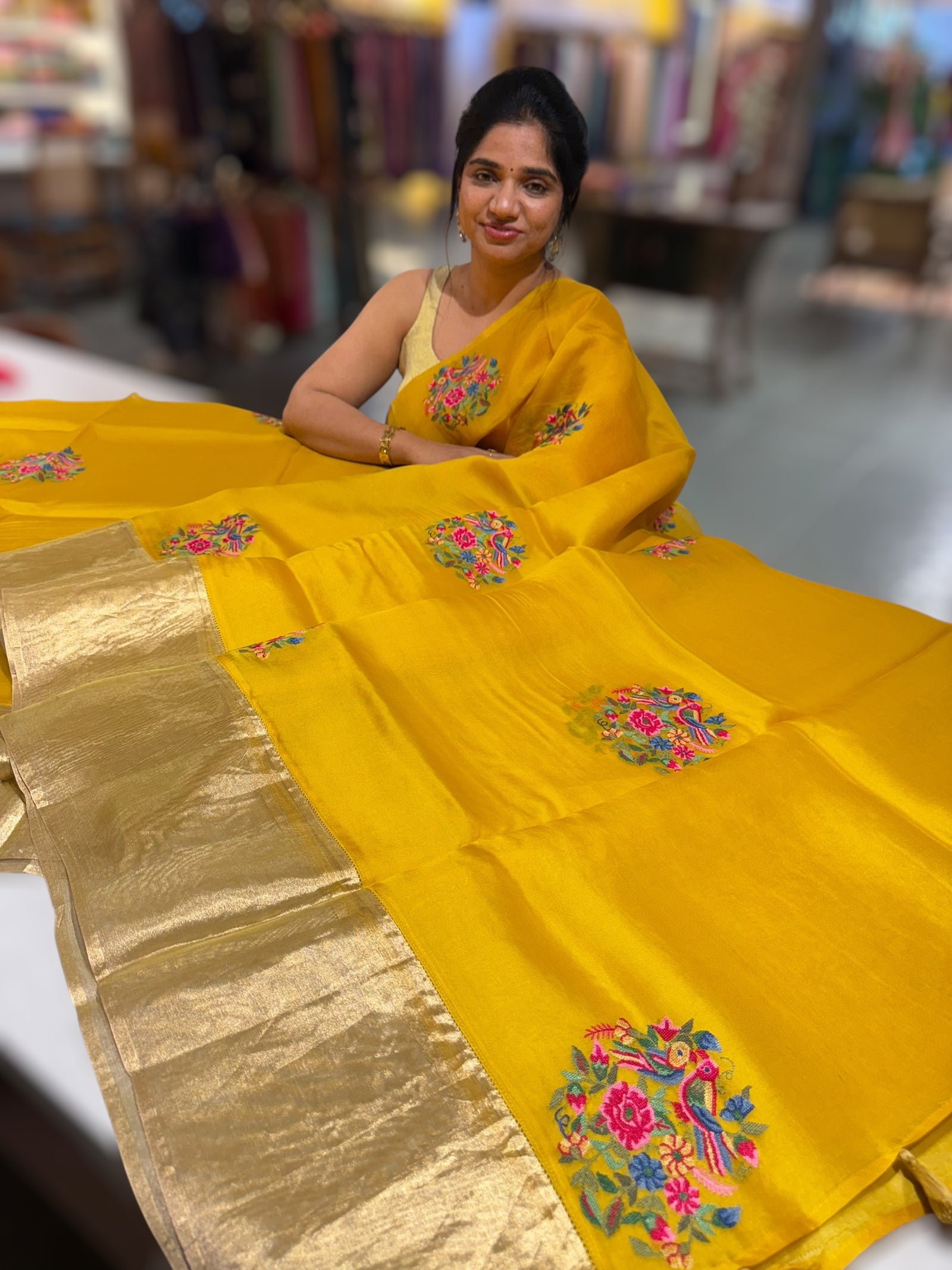 Yellow Organza Saree with pure Tissue Border