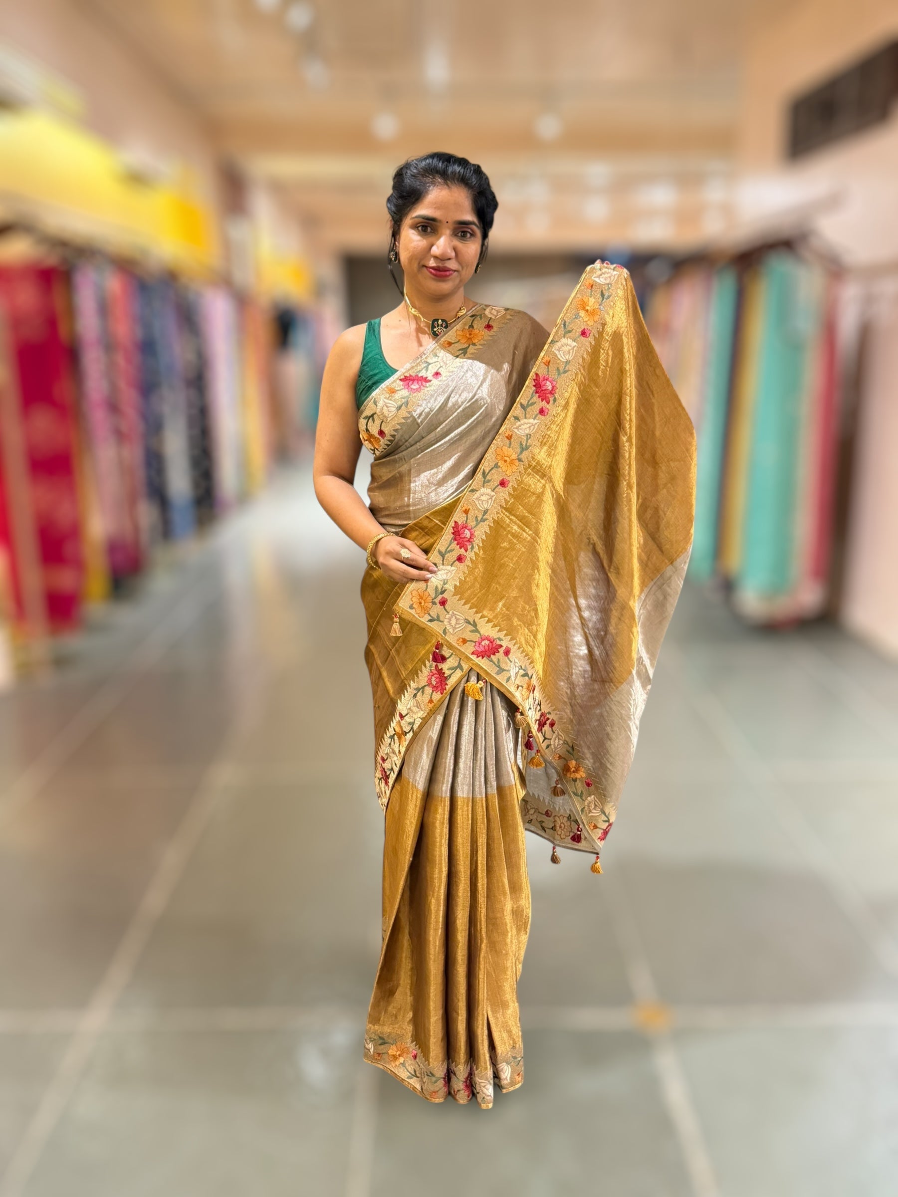 Handloom Tissue Saree with Paithani inspired embroidered border.