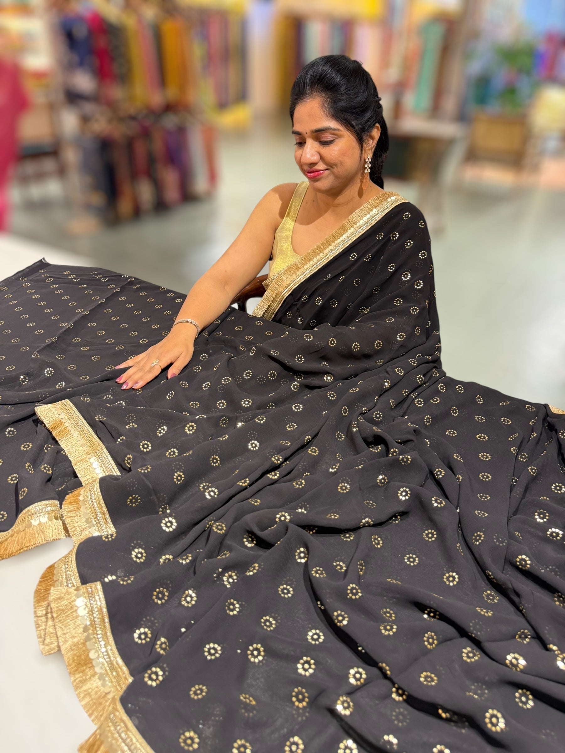 Black Georgette Saree with stick on Badla in flower pattern