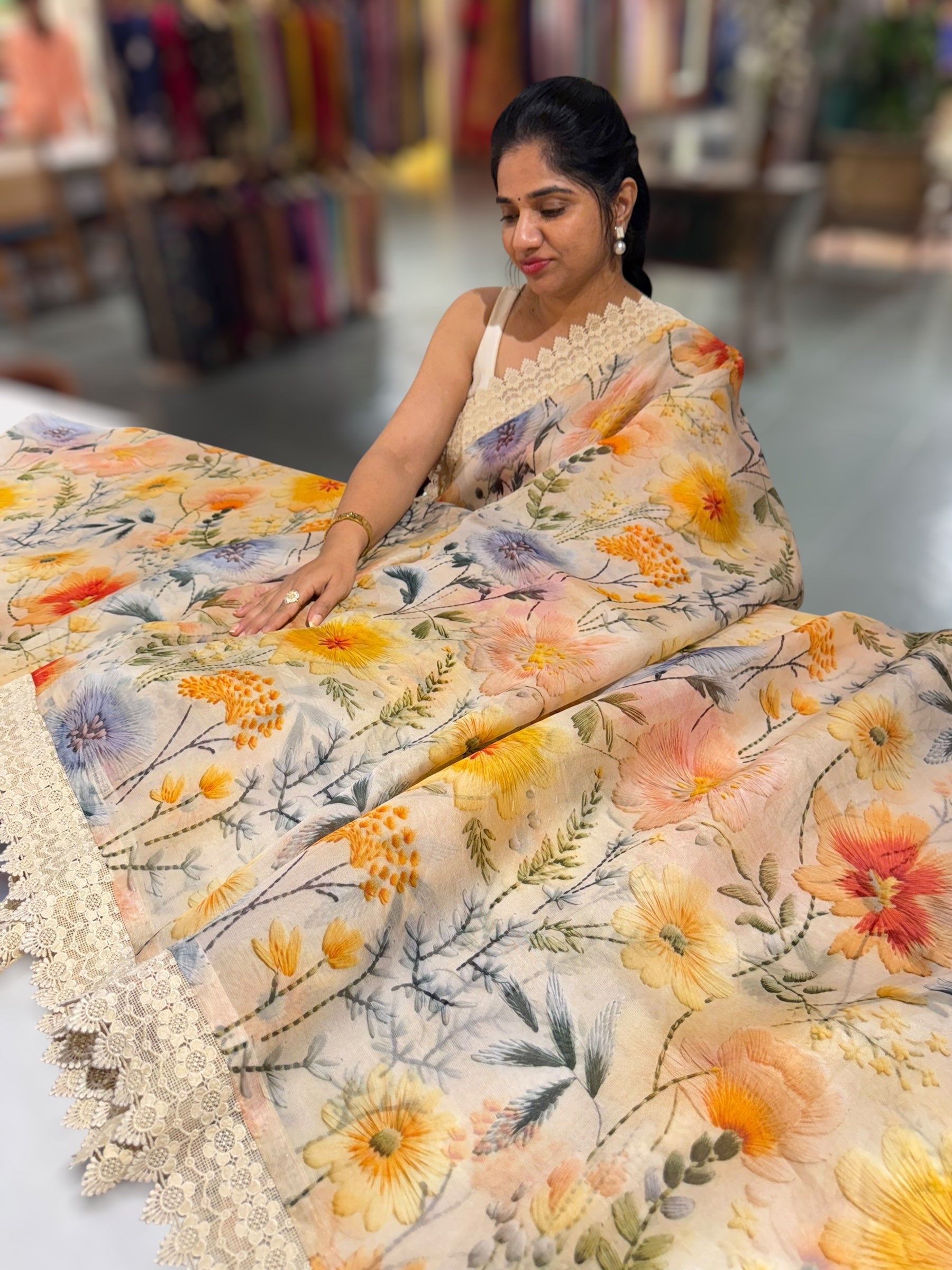 Beige Organza 3D floral Printed Saree hemlined with crotia lace