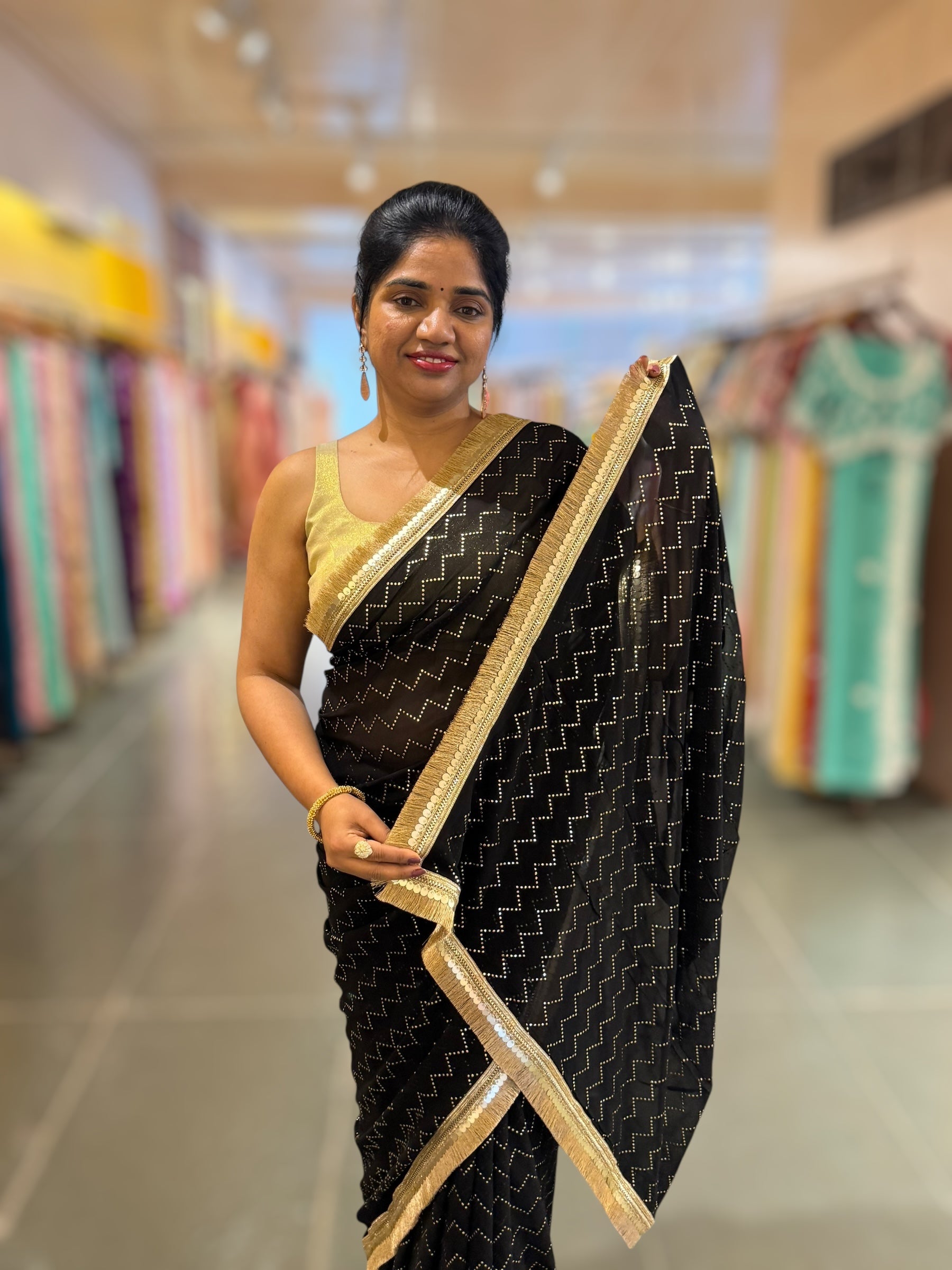 Black Georgette Saree with stick on Badla in zigzag pattern