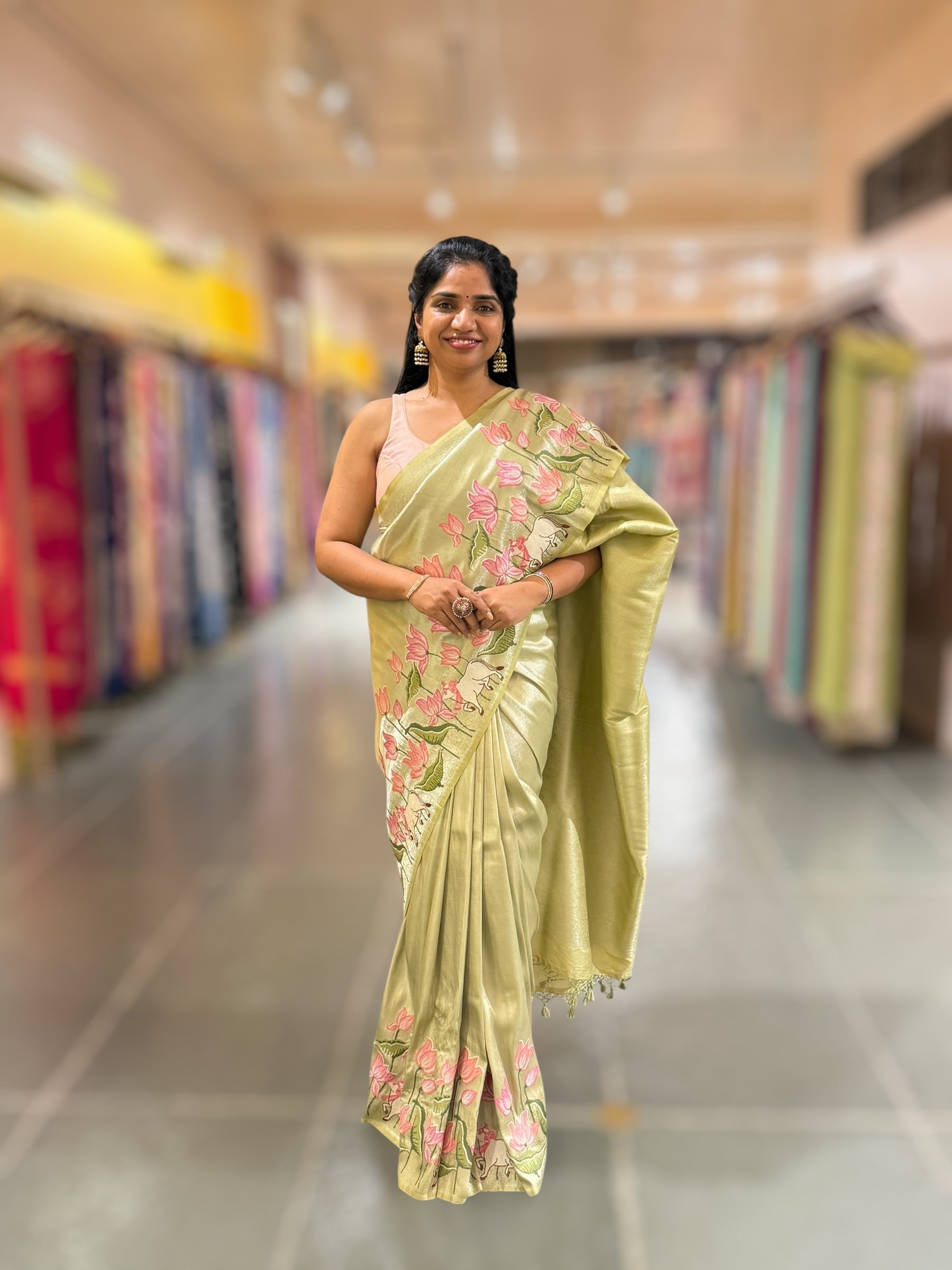 Pista Banarasi Brocade Saree with Pichwai Embroidered Skirt Border.