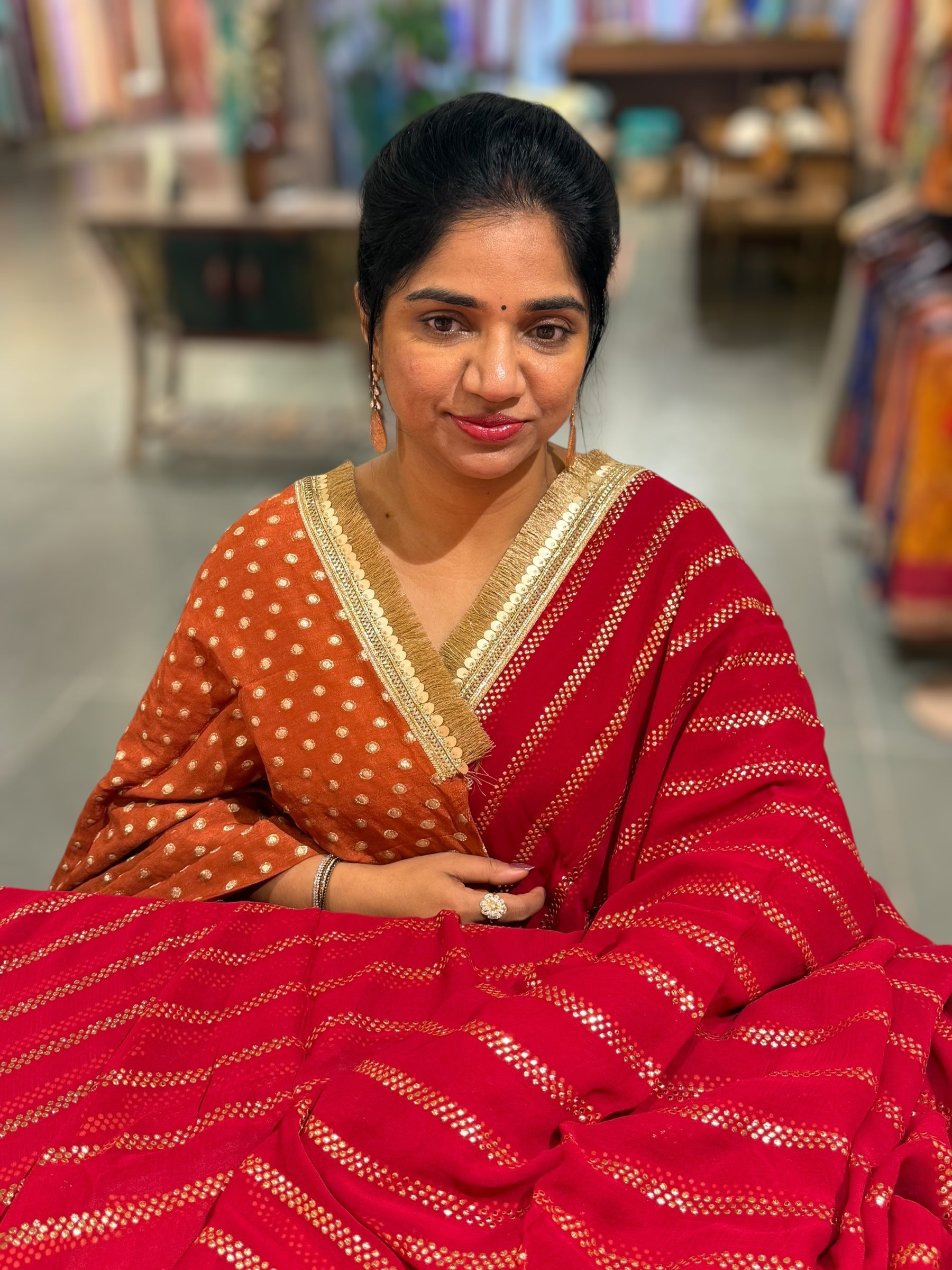 Dark Red Georgette Saree with stick on Badla in stripes pattern and kiran Lace