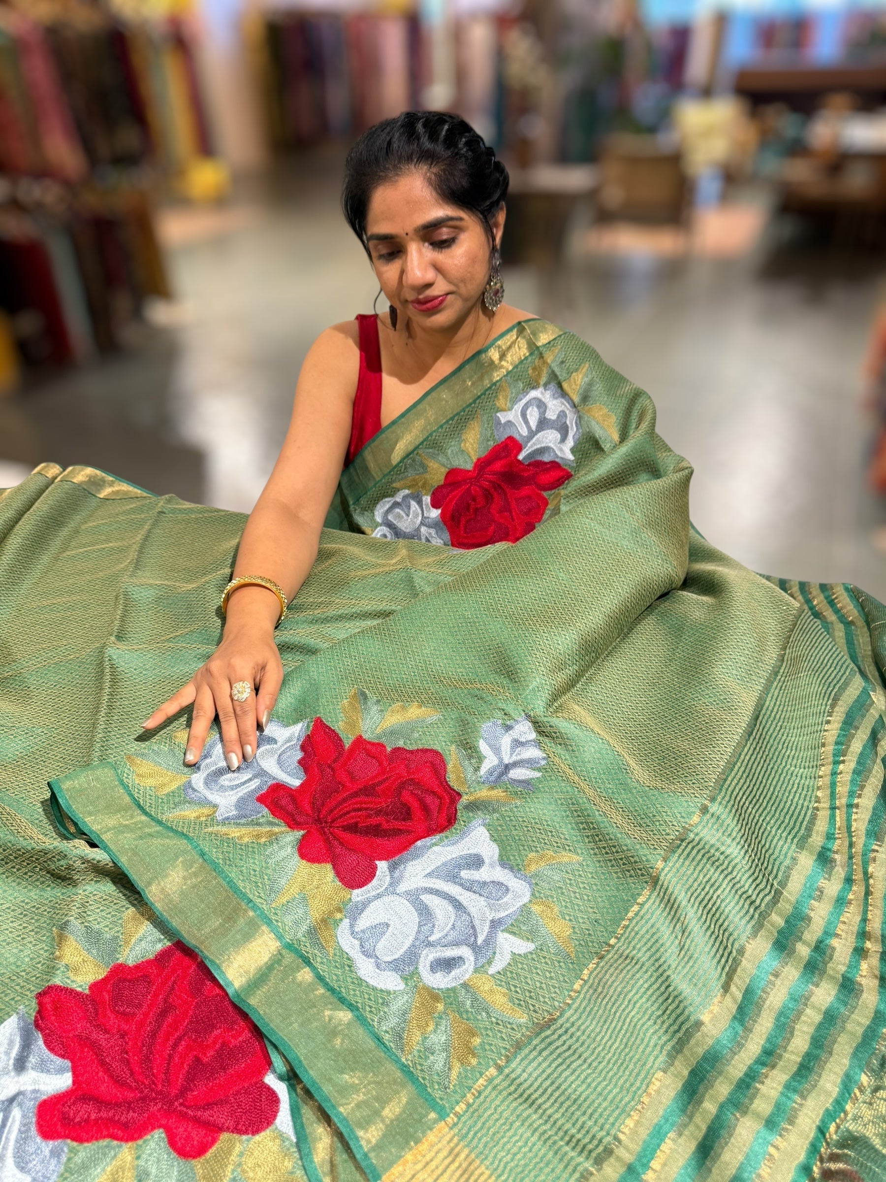Emerald Green Tussar Brocade Saree With Statement Red Rose Embroidery.