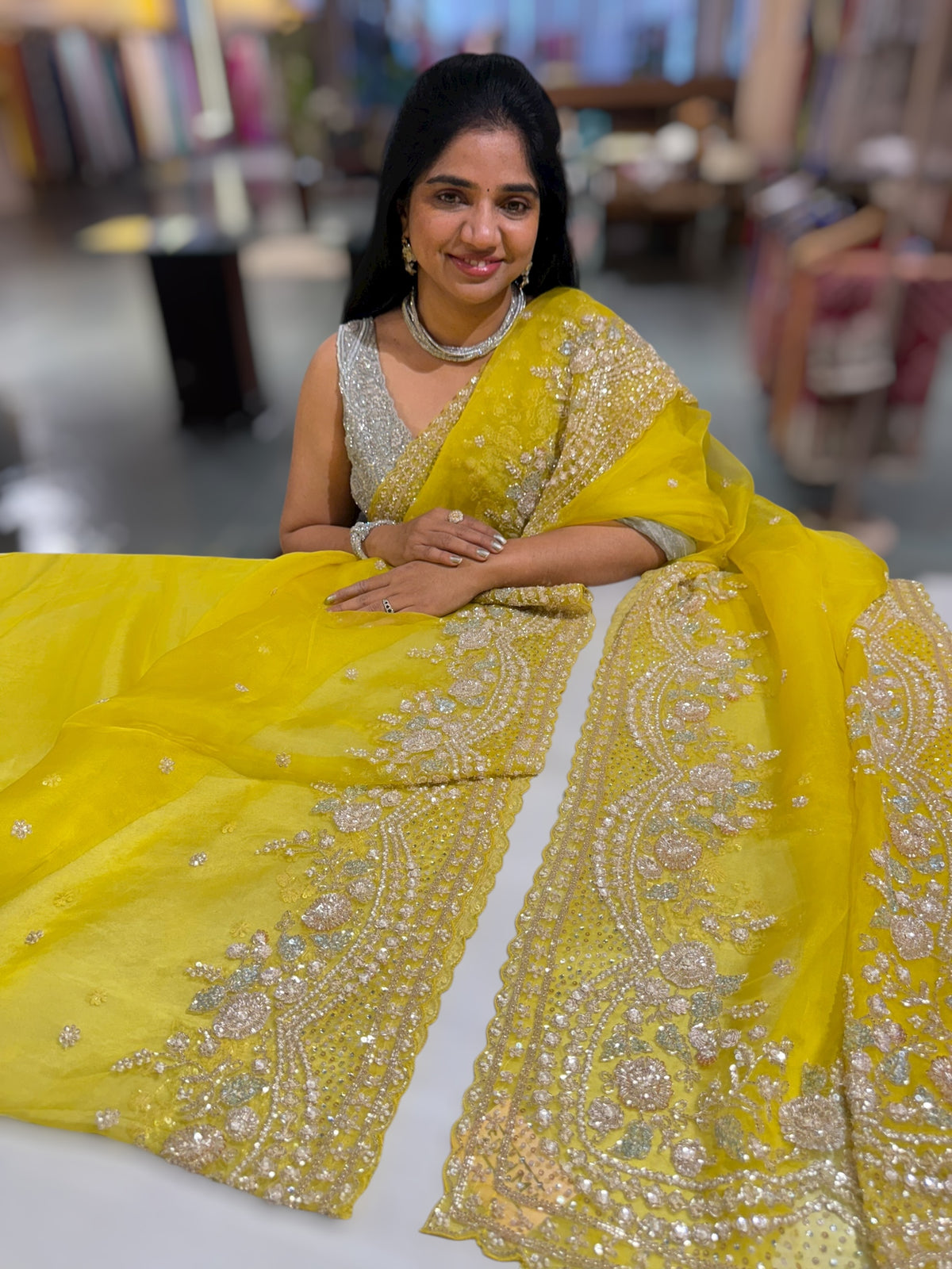 Lemon Yellow Organza Silk Saree with heavy intricate handwork