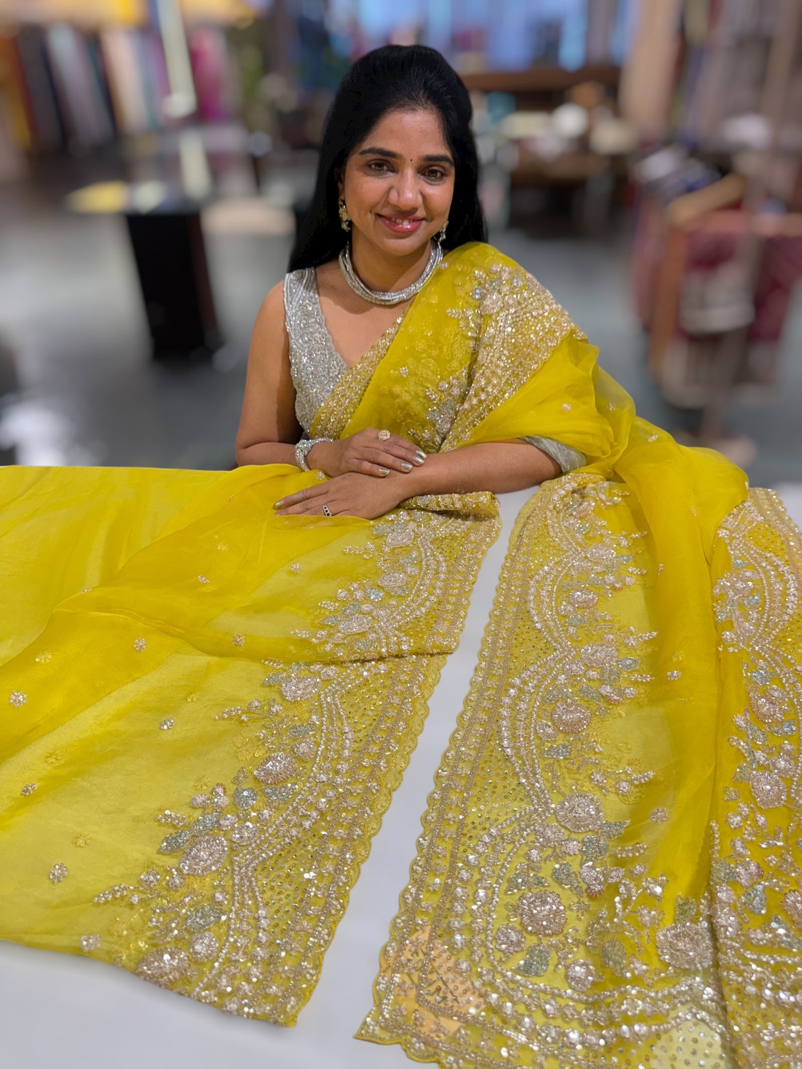 Lemon Yellow Organza Silk Saree with heavy intricate handwork