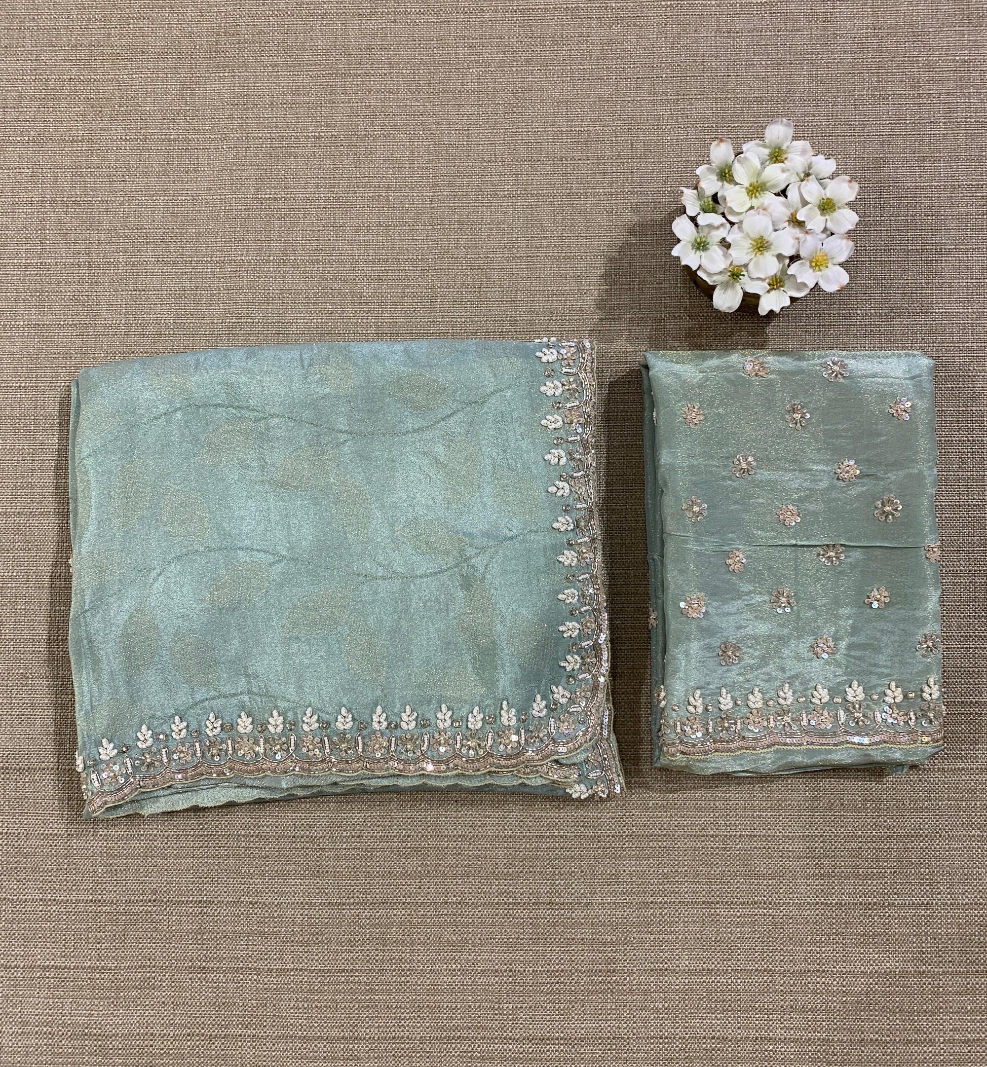 Pastel Blue Tissue Gorgette Saree With Hanwork Border and Blouse.