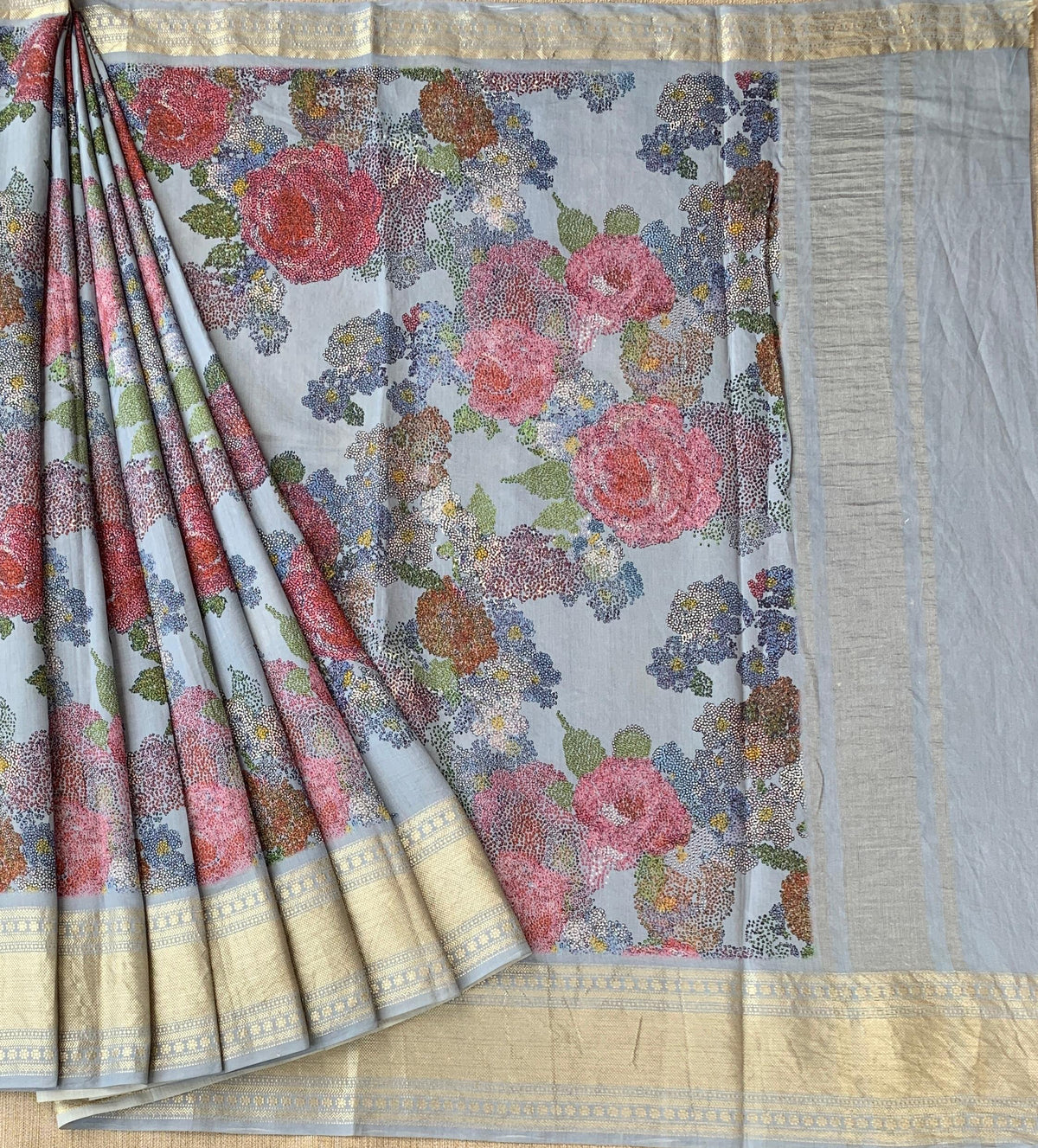 Dusty Blue Pure Handloom Chiniya Silk Saree with stunning Floral Print and zari borders