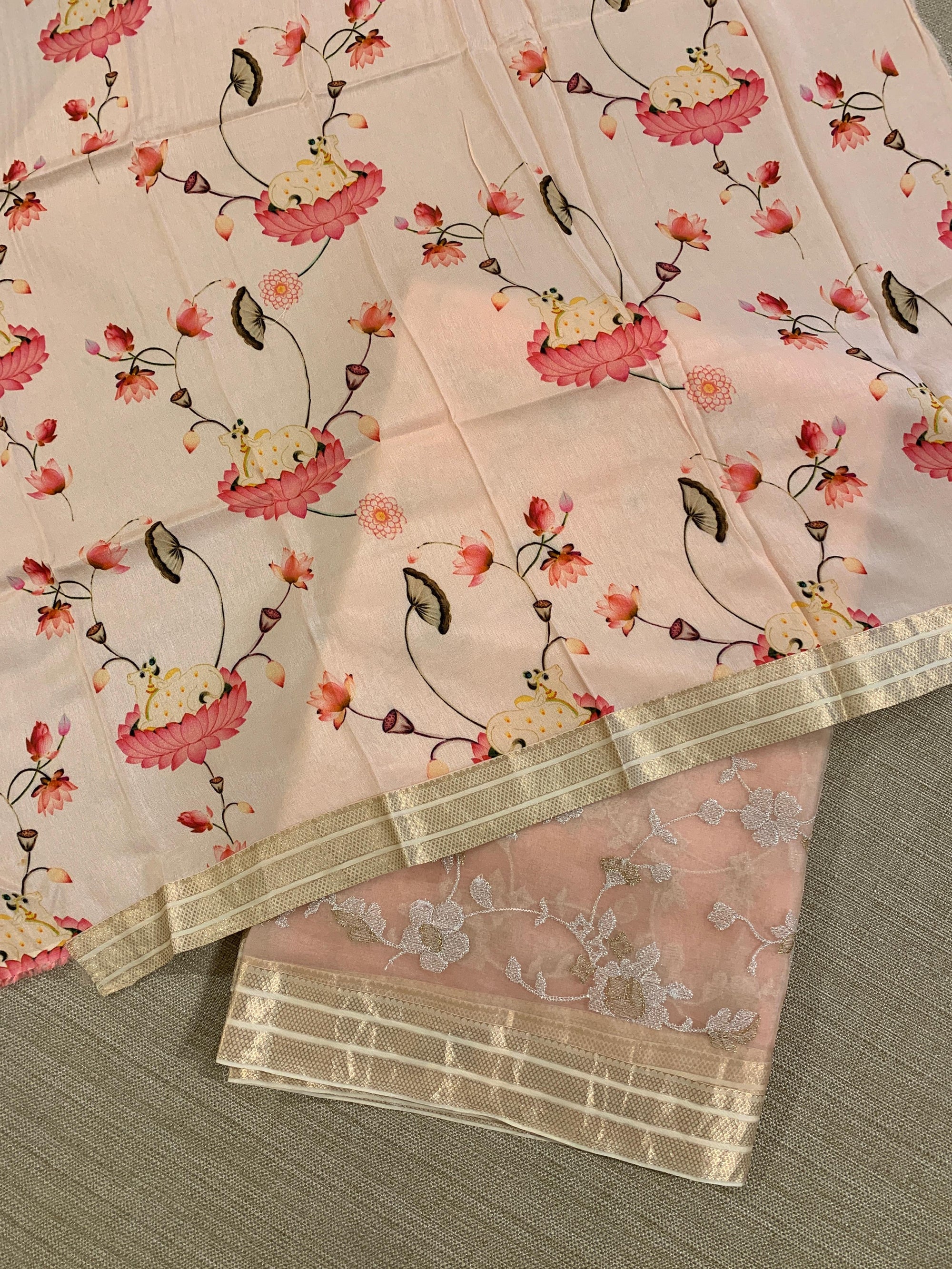 Peach Muslin allover embroidered Saree with pichwai printed blosue