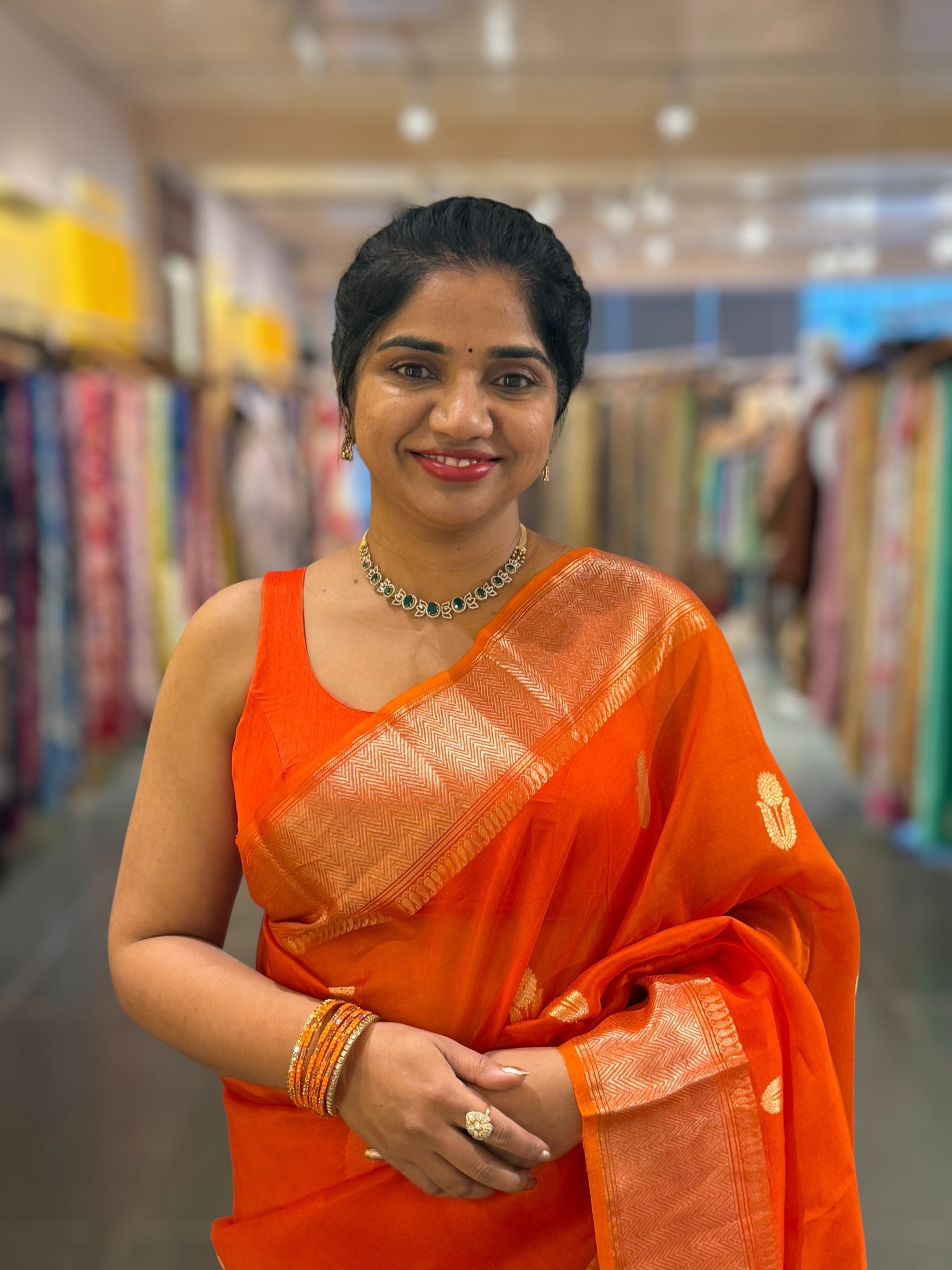 Orange Premium Kora Banarasi Saree with heavy weaving borders and Raw mango style motifs