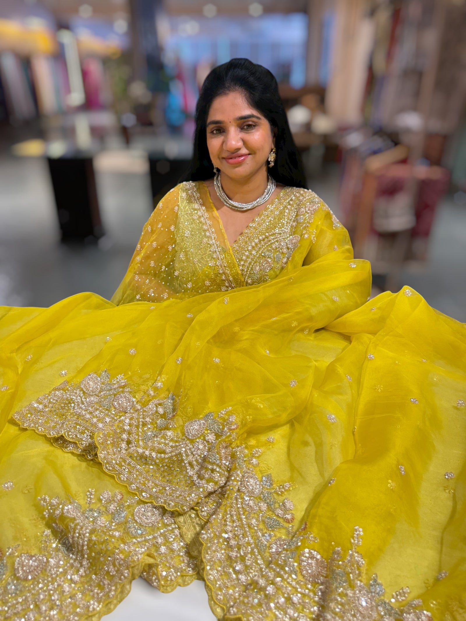 Lemon Yellow Organza Silk Saree with heavy intricate handwork