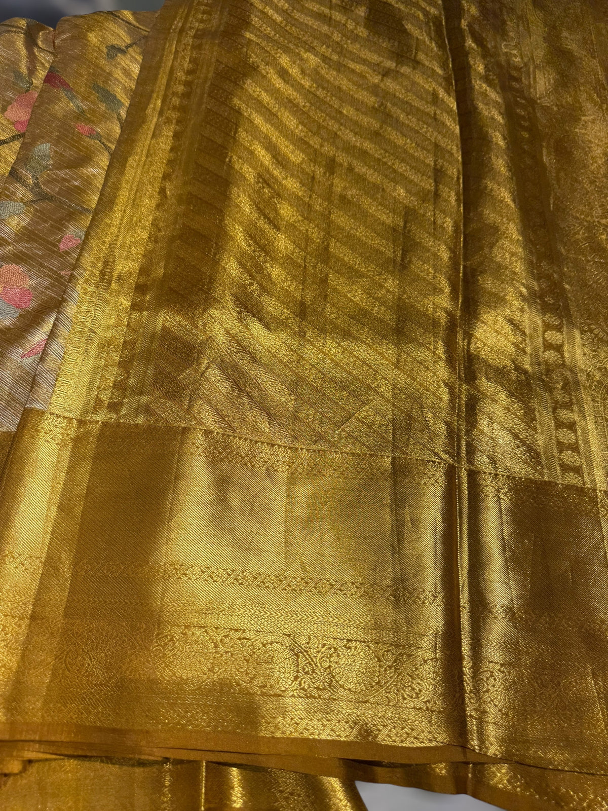 Molten Gold Kanjeevaram Tissue Saree with allover embroidery