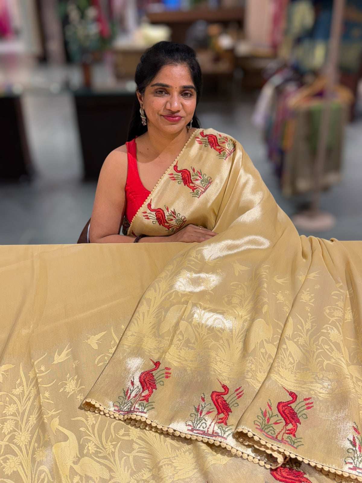 Pastel yellow Banarasi Brocade tissue saree with tonchui style weaving & petite point embroidered swan border