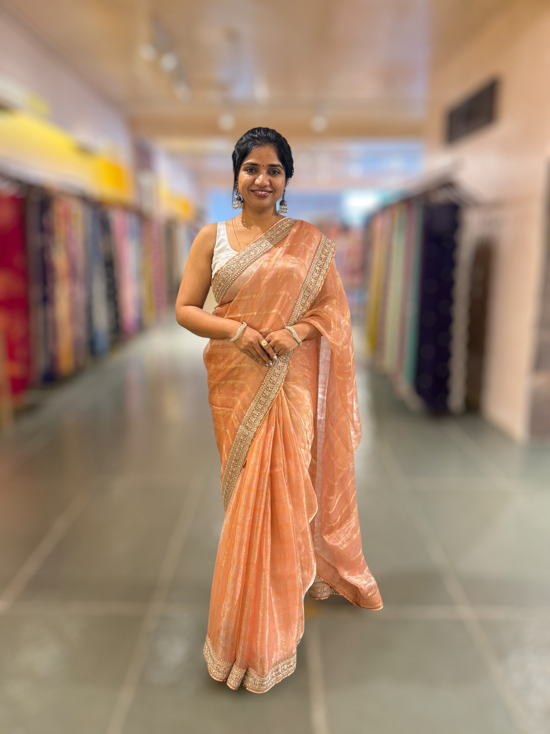 Peach Banarasi Tissue checks Saree with Sabyasachi Borders