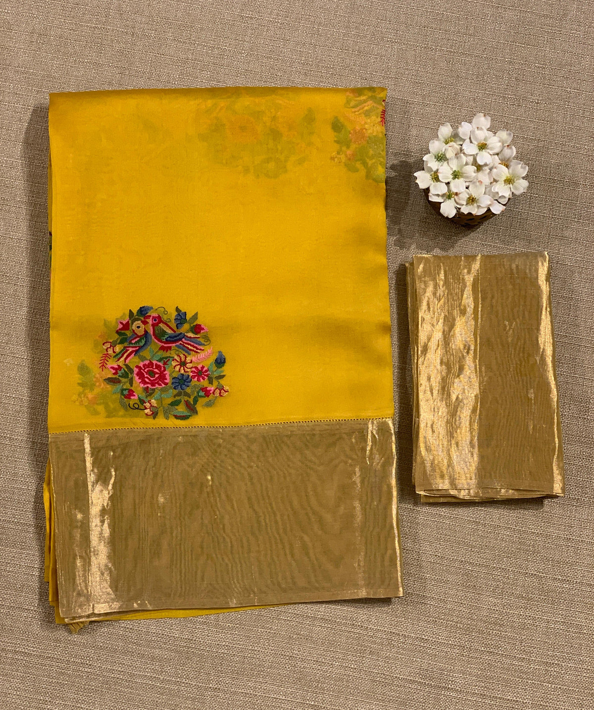 Yellow Organza Saree with pure Tissue Border