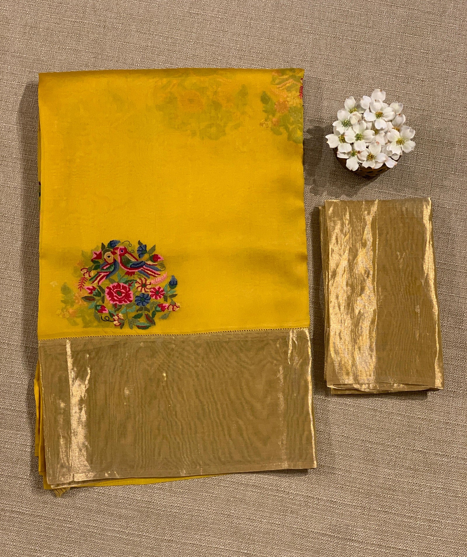 Yellow Organza Saree with pure Tissue Border
