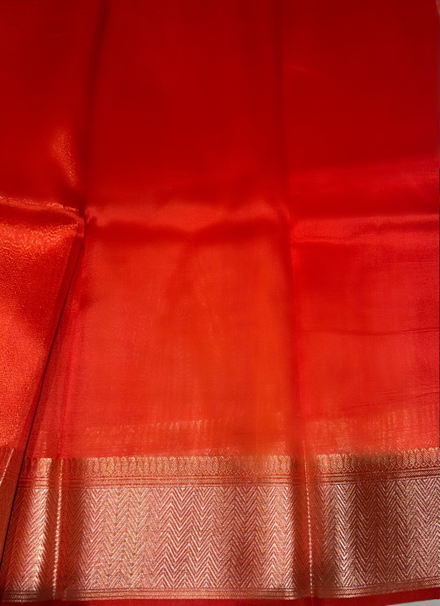 Orangish Red Premium Kora Banarasi Saree with heavy weaving borders and Raw mango style motifs