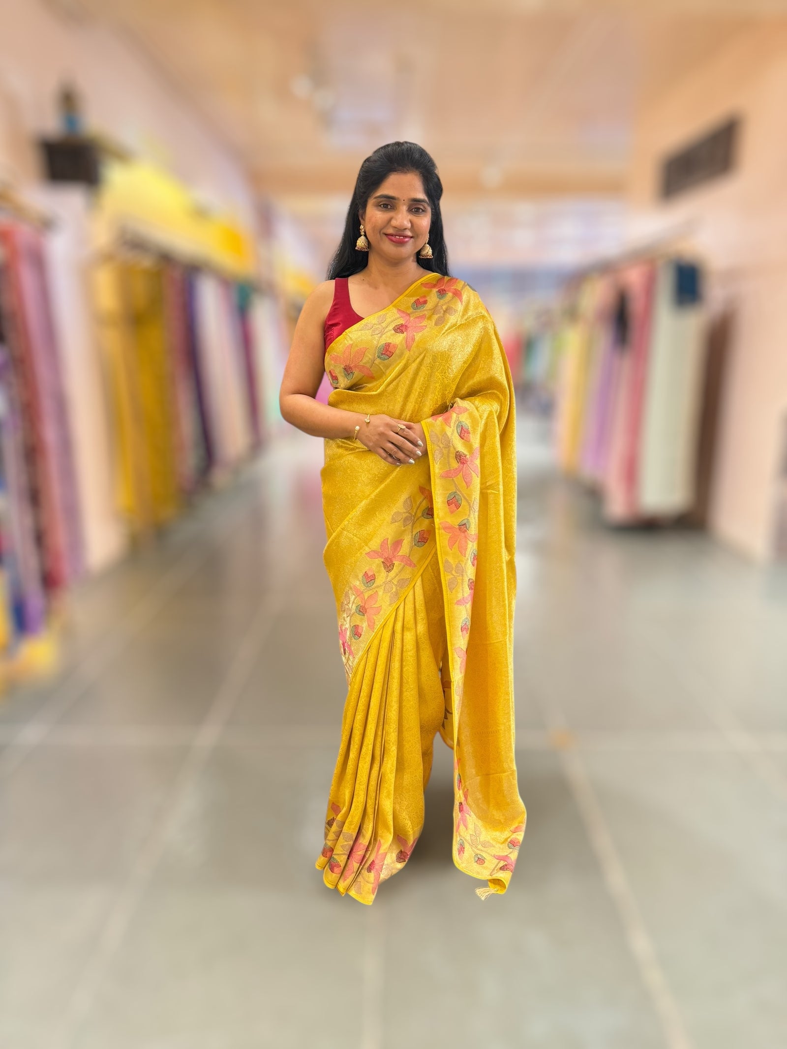 Yellow Banarasi Brocade tissue saree with tonchui style weaving & pythani inspired embroidered border