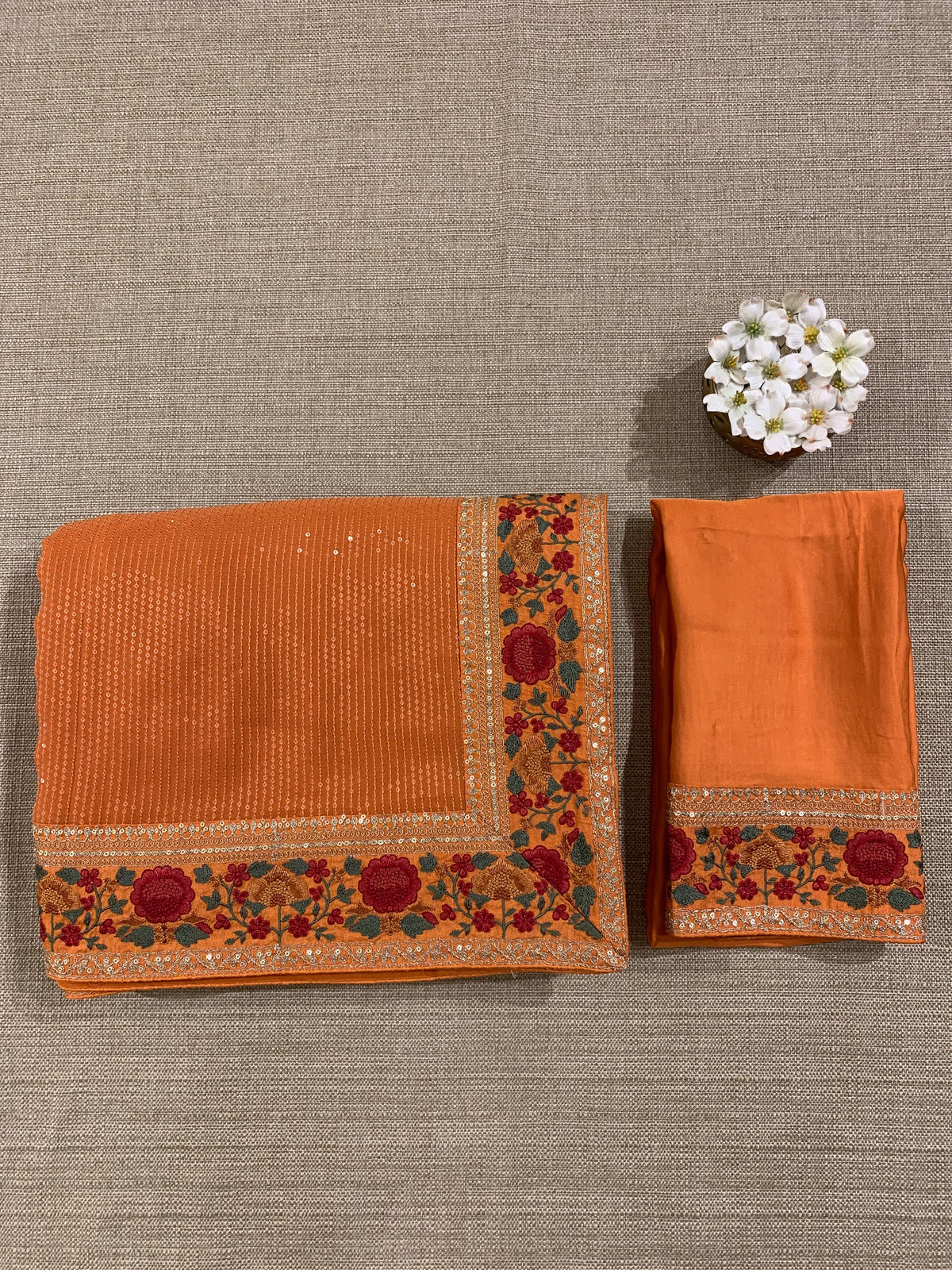 Orange Georgette sequnce Saree with Sabyasachi borders