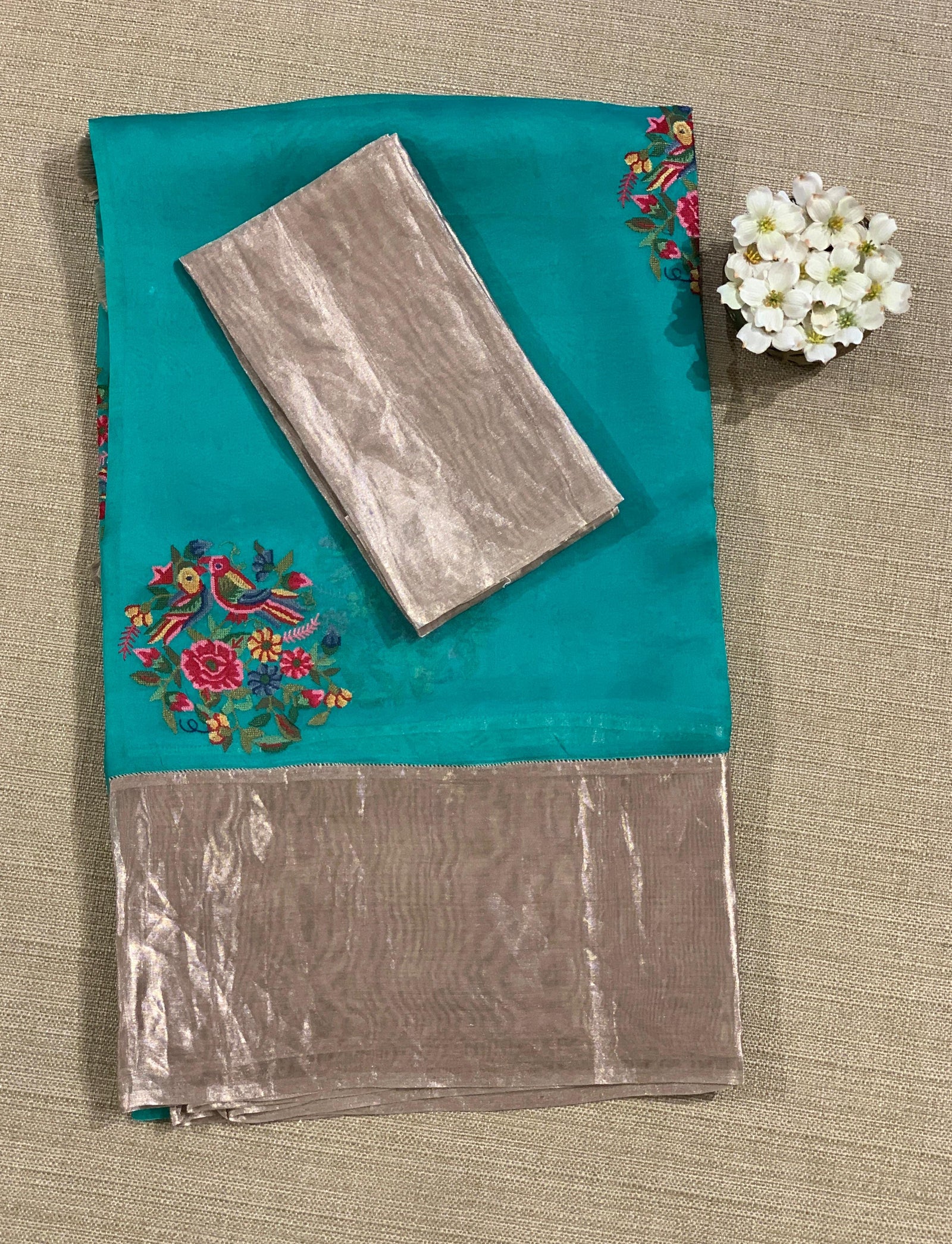 Teal Organza Saree with pure Tissue Border