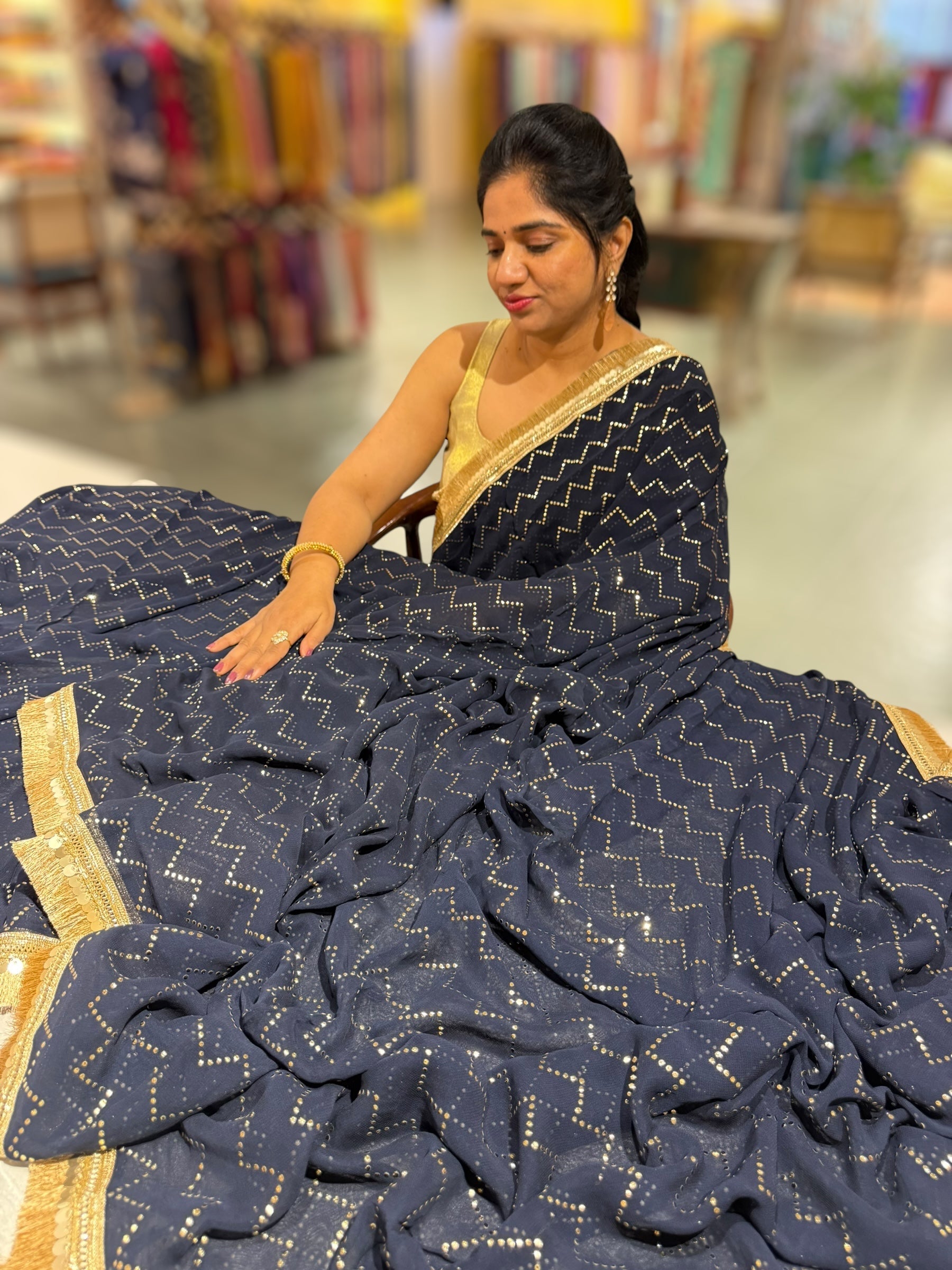 Navy Georgette Saree with stick on Badla in zigzag pattern