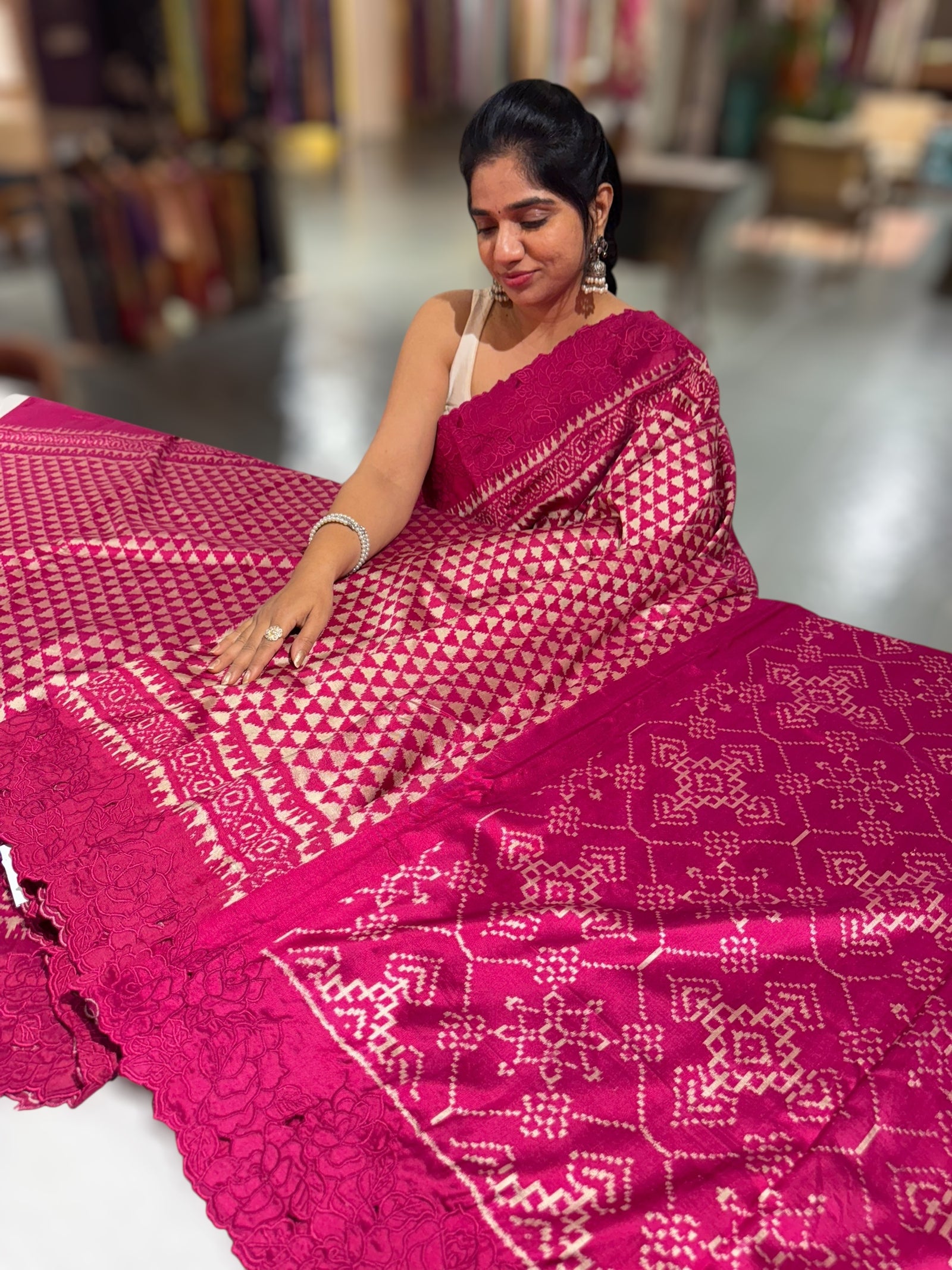 Ruby pink Cambodian–inspired Ikkat Silk Saree with cutwork Rose Border