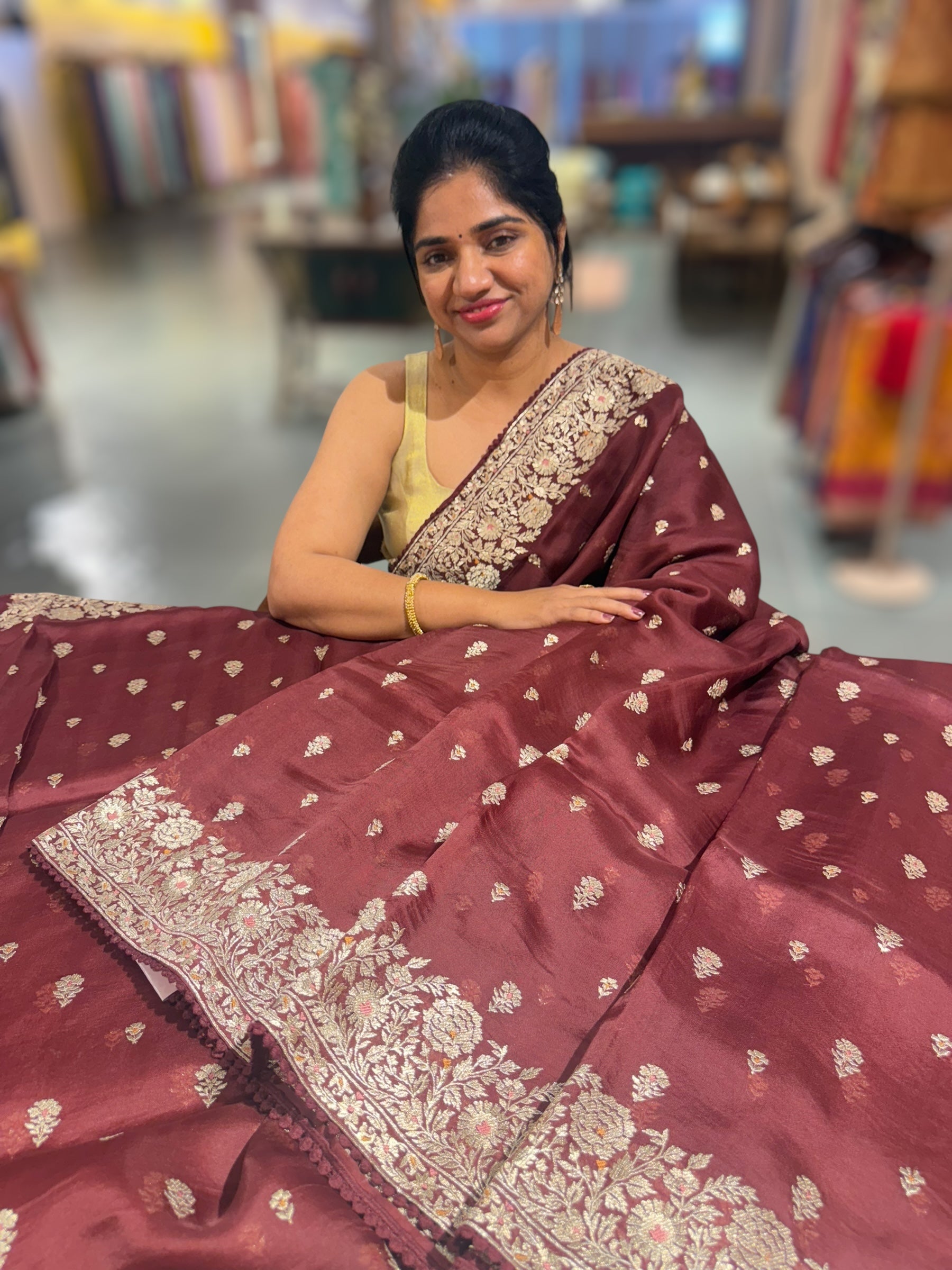 Meroonish Brown  Organza Saree with stunning heavy zari embroidered border and alloevr motifs