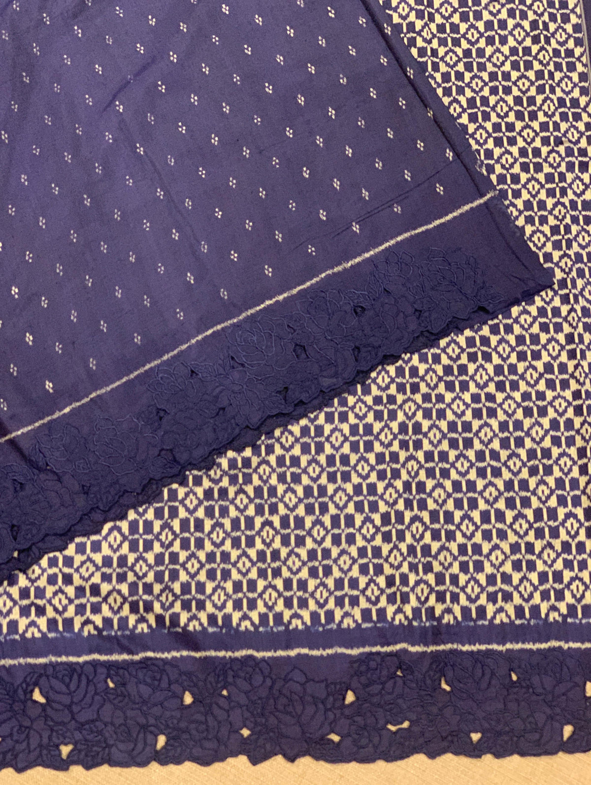 Midnight Blue Cambodian–inspired Ikkat Silk Saree with cutwork Rose Border