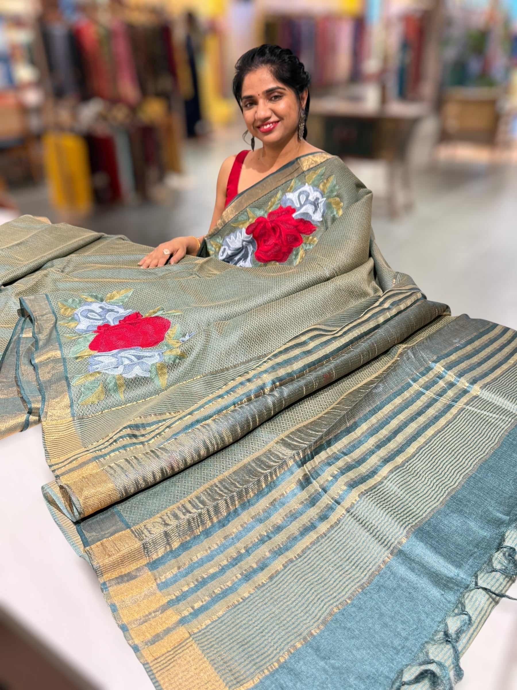 Sage Green Tussar Brocade Saree With Statement Red Rose Embroidery.