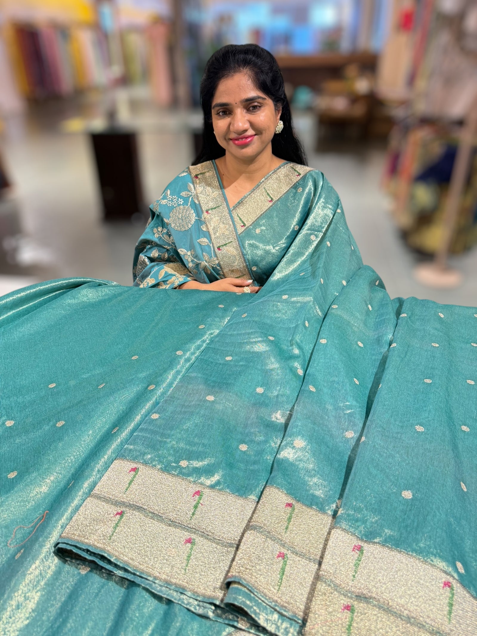 Teal Tissue Saree with pythani inspired muniya borders