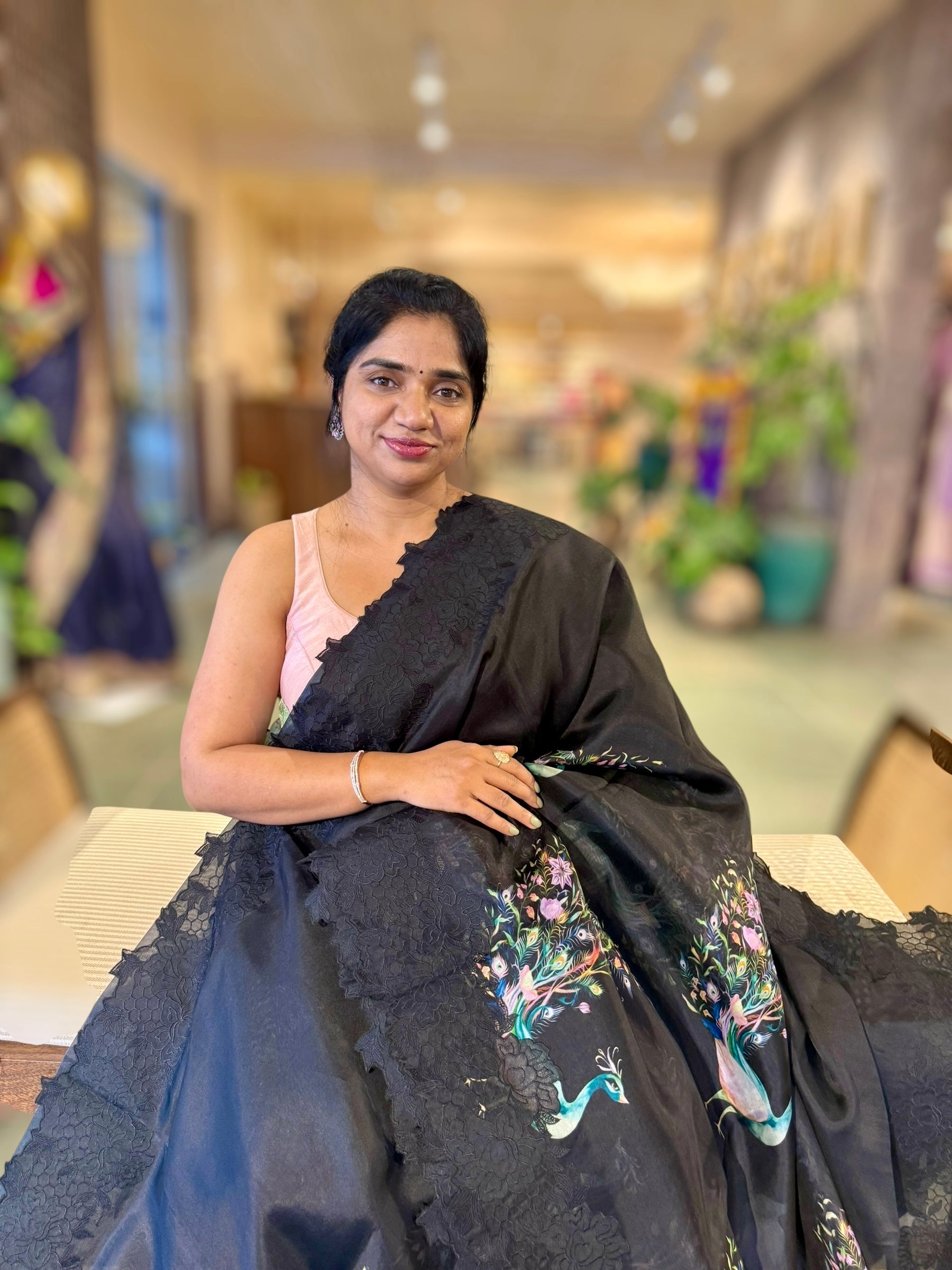 Black Printed Organza Saree With Chantilly Lace Style Embroidered Border.