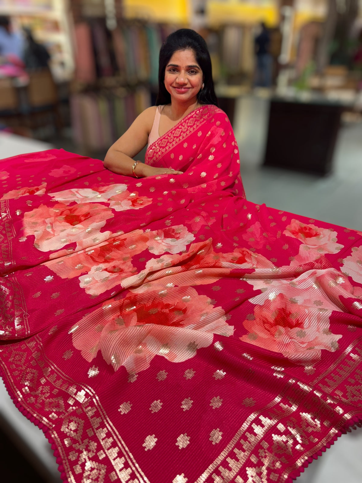 Reddish Pink georgette sequence saree with statement floral print