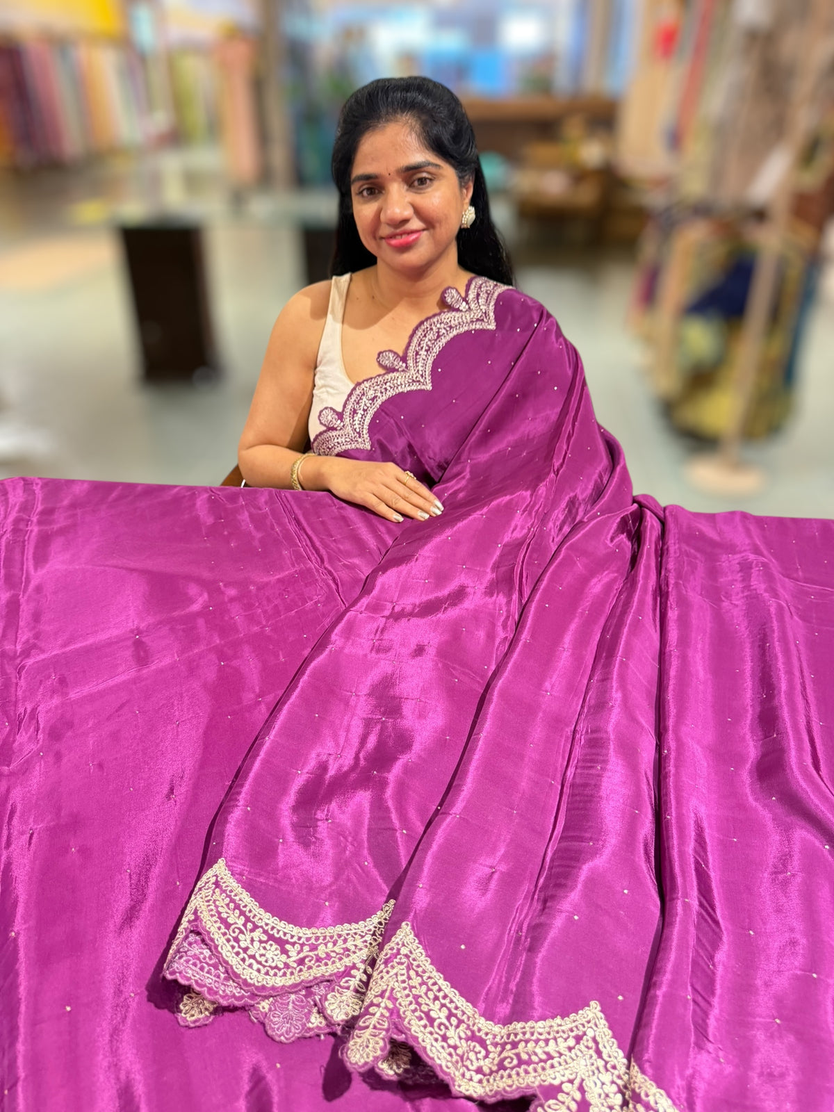 Wine crepe silk saree with scalloped pita border
