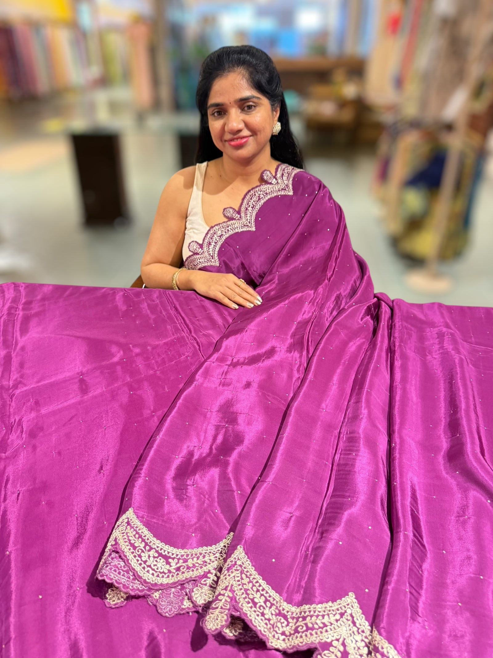 Wine crepe silk saree with scalloped pita border