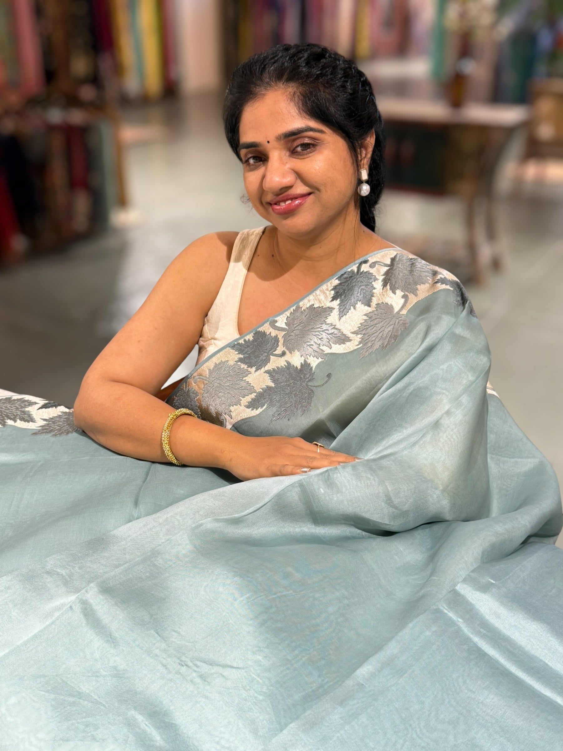 Dark Powder Blue Organza Saree with Stunning Leaf Embroidered Border