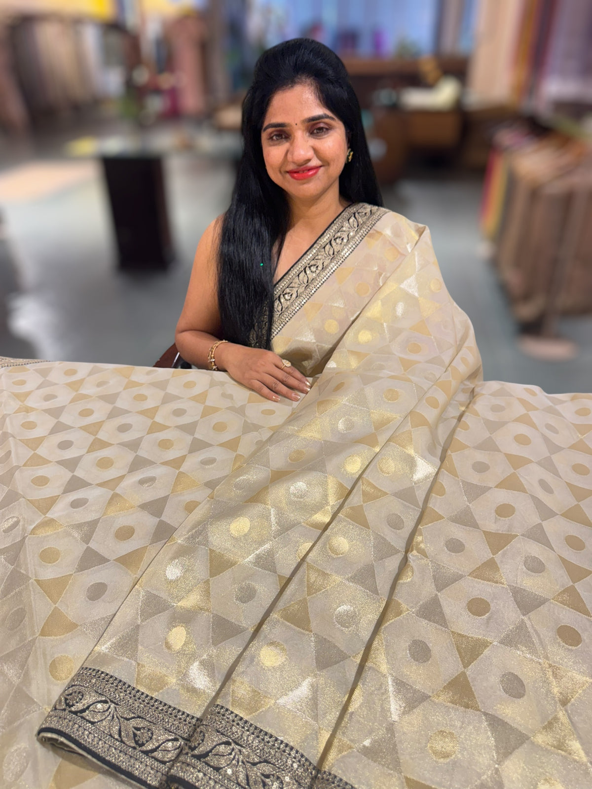 Beige Tissue Saree with Black Sabhyasachi borders