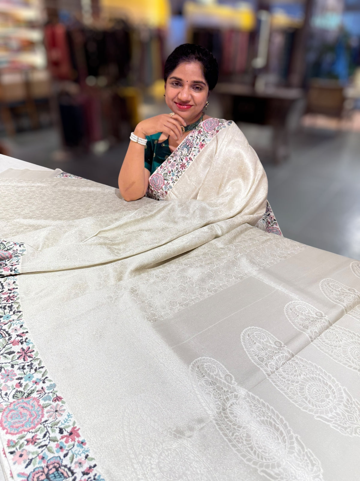 Half White Banarasi brocade Silk Saree with Petite Point Embroidered Border.