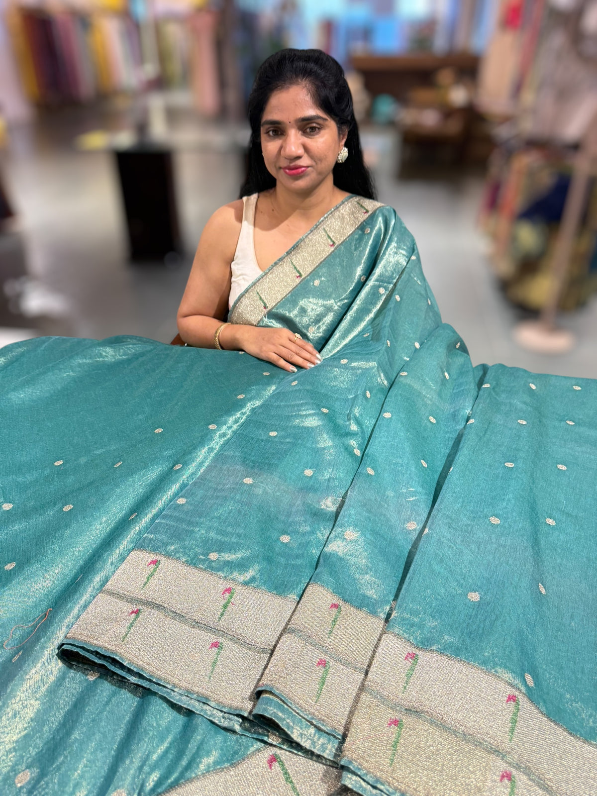 Teal Tissue Saree with pythani inspired muniya borders