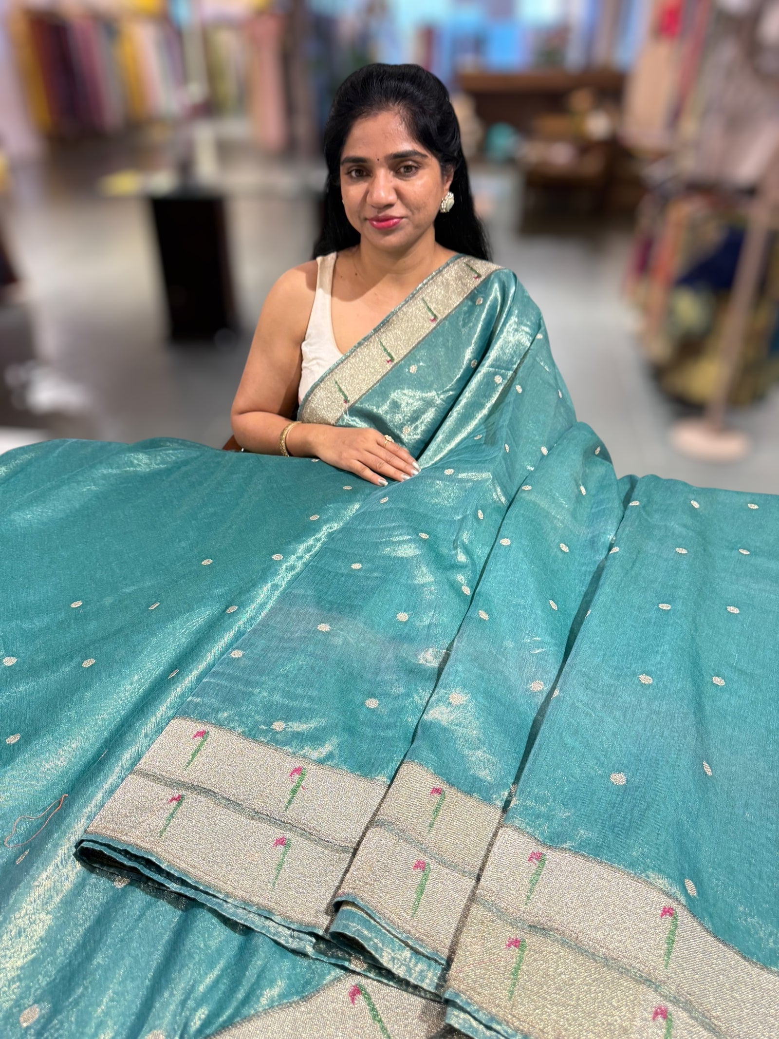 Teal Tissue Saree with pythani inspired muniya borders