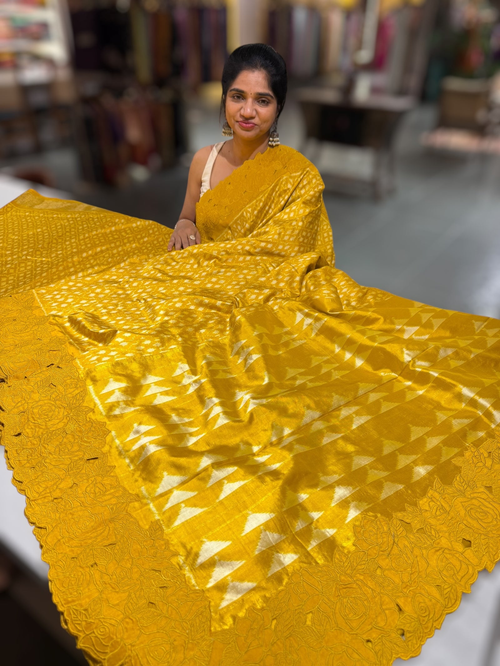 Mustard Cambodian–inspired Ikkat Silk Saree with cutwork Rose Border