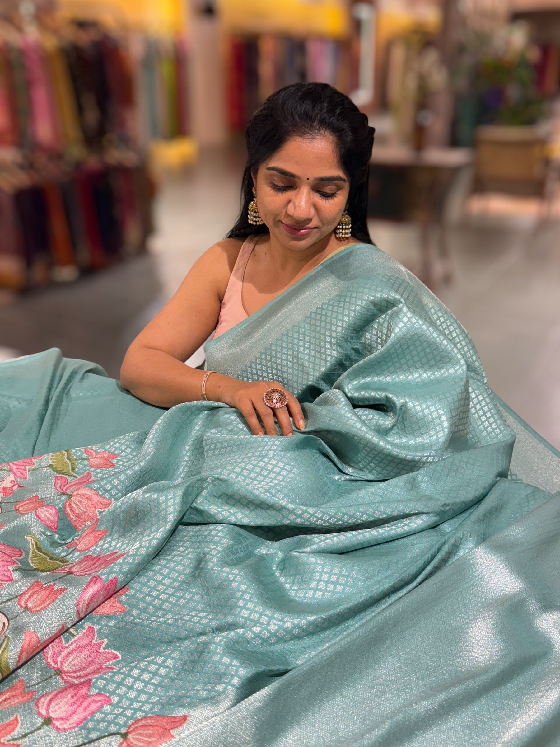 Teal Blue Banarasi Brocade Saree with Pichwai Embroidered Skirt Border.