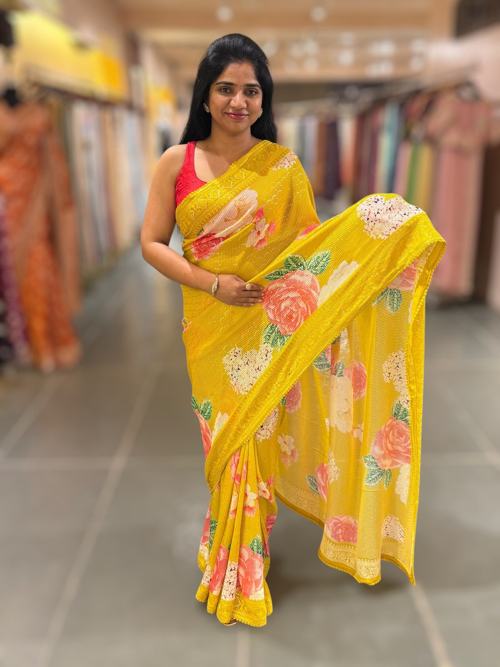Yellow georgette sequence saree with statement floral print
